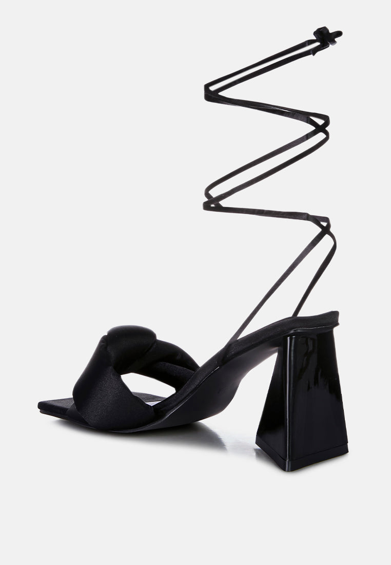 Black satin triangular block-heel sandal with long ankle ribbon ties