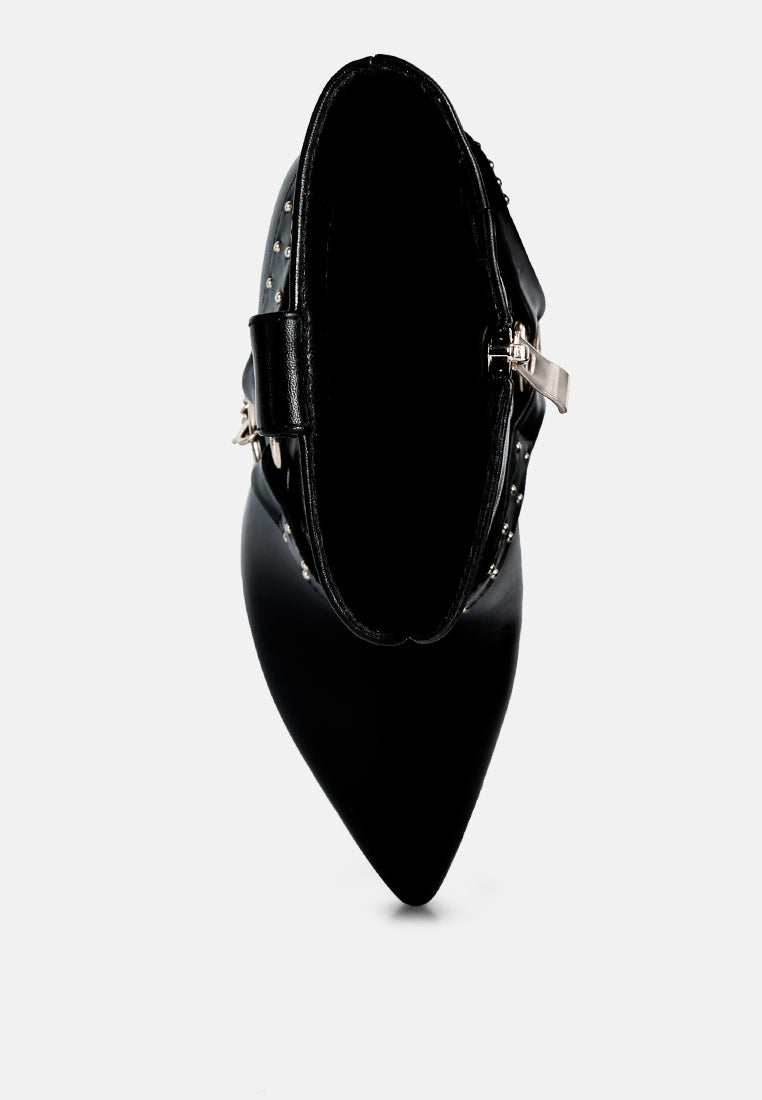Black Pro Tip Bootie, heel view: sleek pointed-toe ankle boot with chain accents