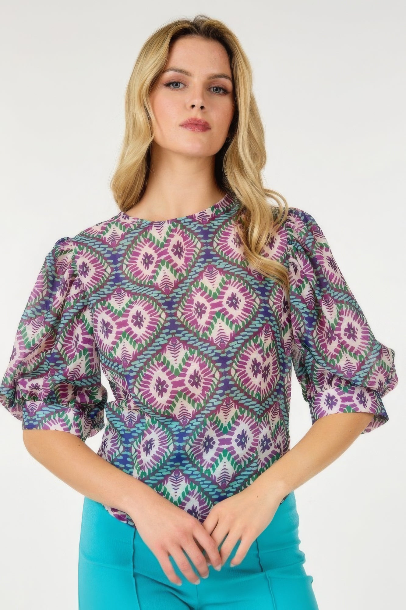 Puff-sleeve multi-print top with purple, green and teal pattern
