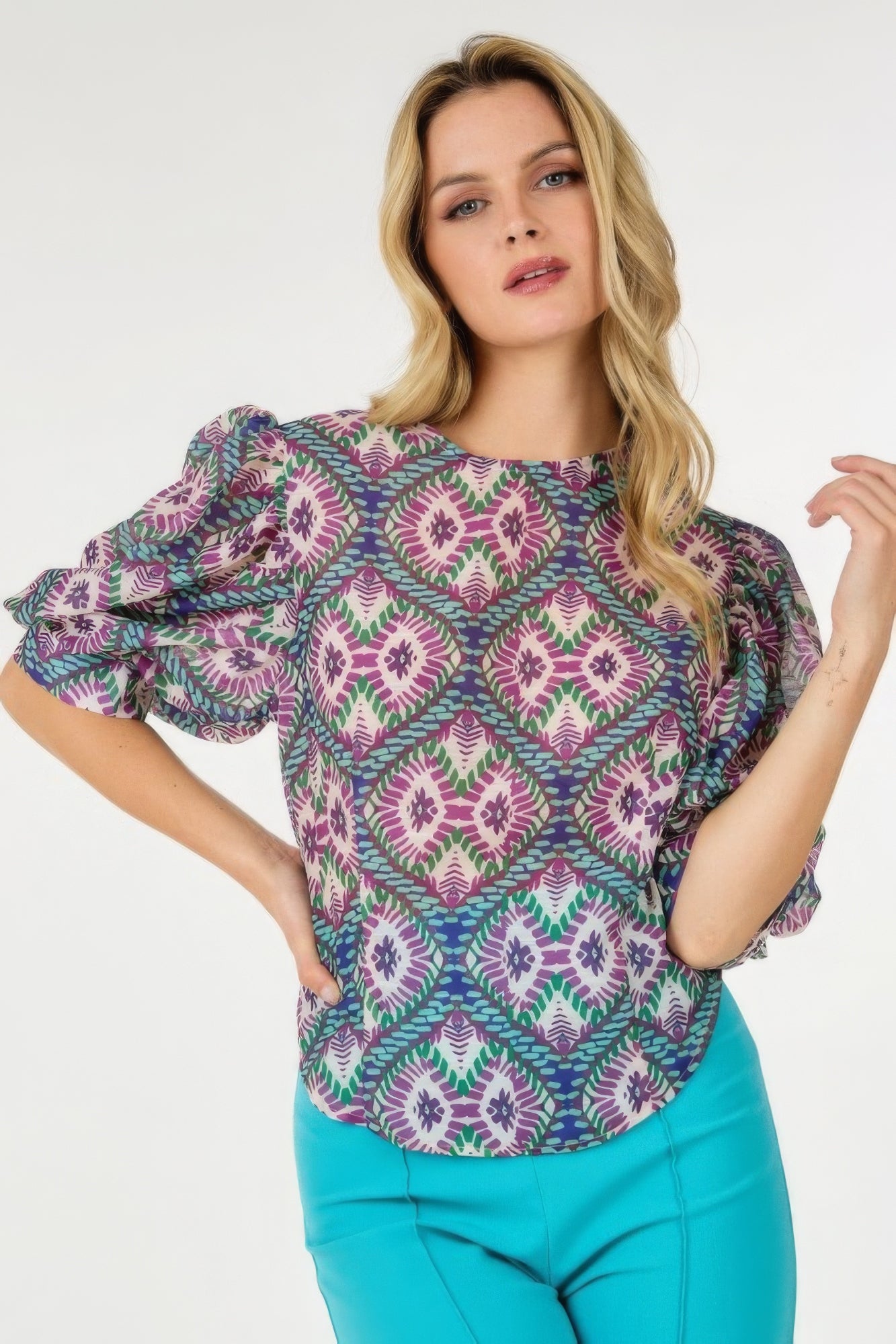 Puff sleeve top, bold purple and green medallion pattern, crew neck