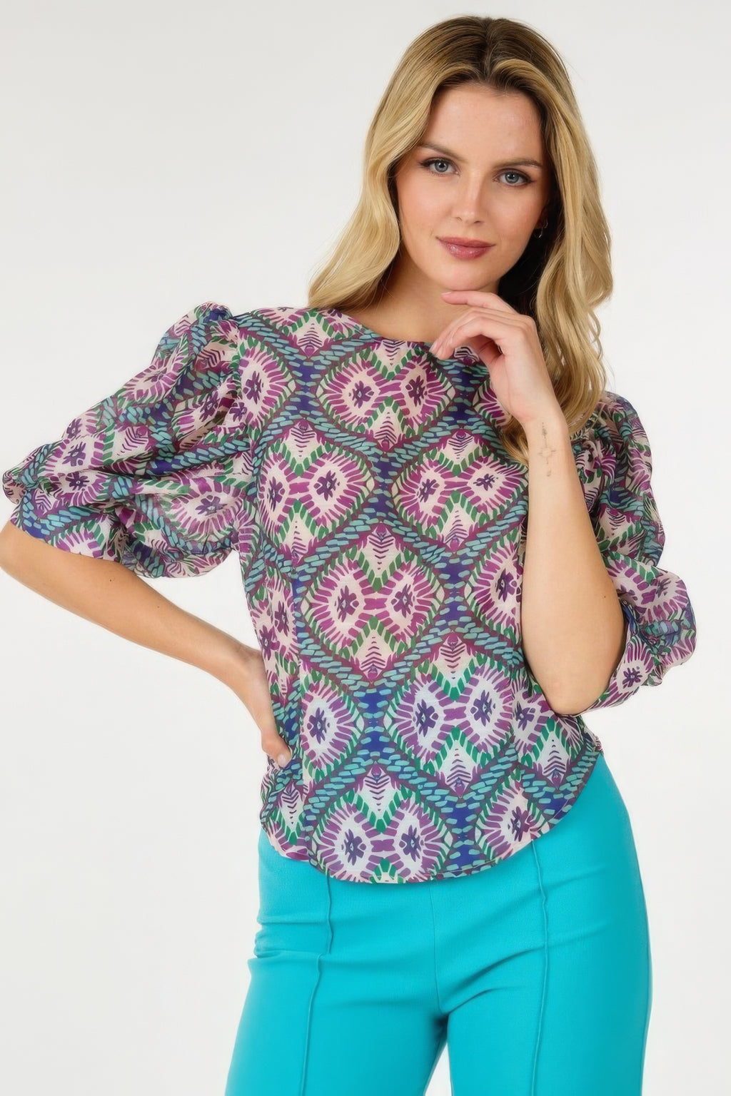 Multi-print blouse with ruffled puff sleeves and purple-green geometric motif