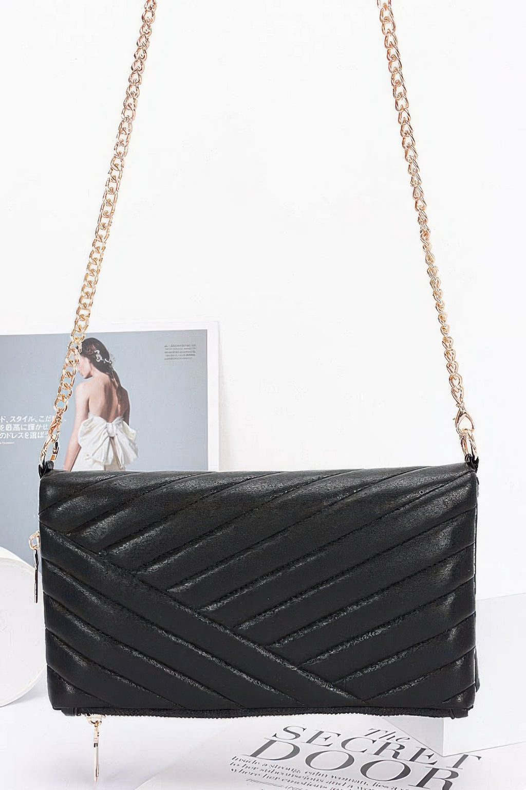 Quilted faux leather shoulder clutch, black with chain strap and zipper top