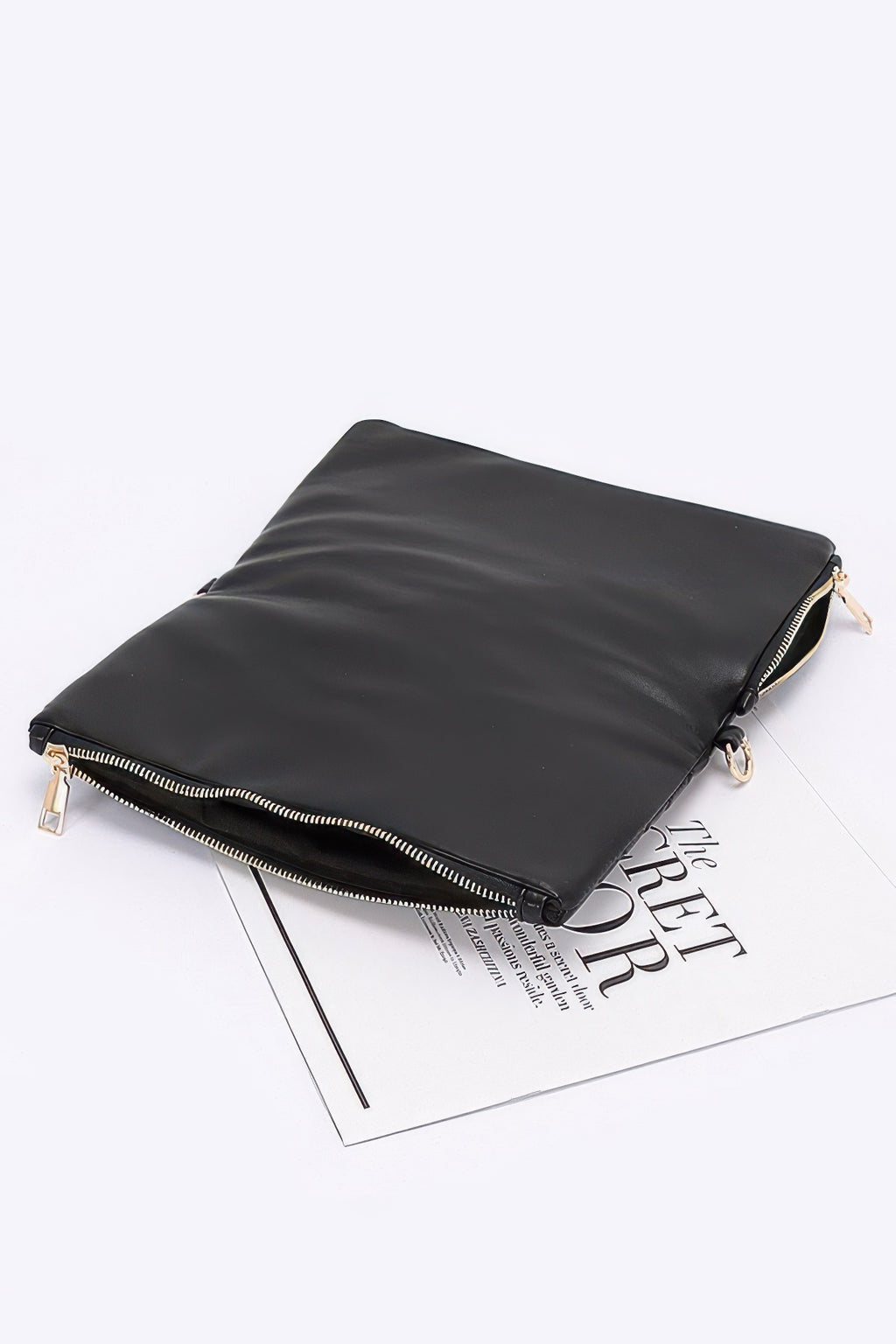 Quilted faux leather half-fold clutch, dark faux leather with gold zipper ends