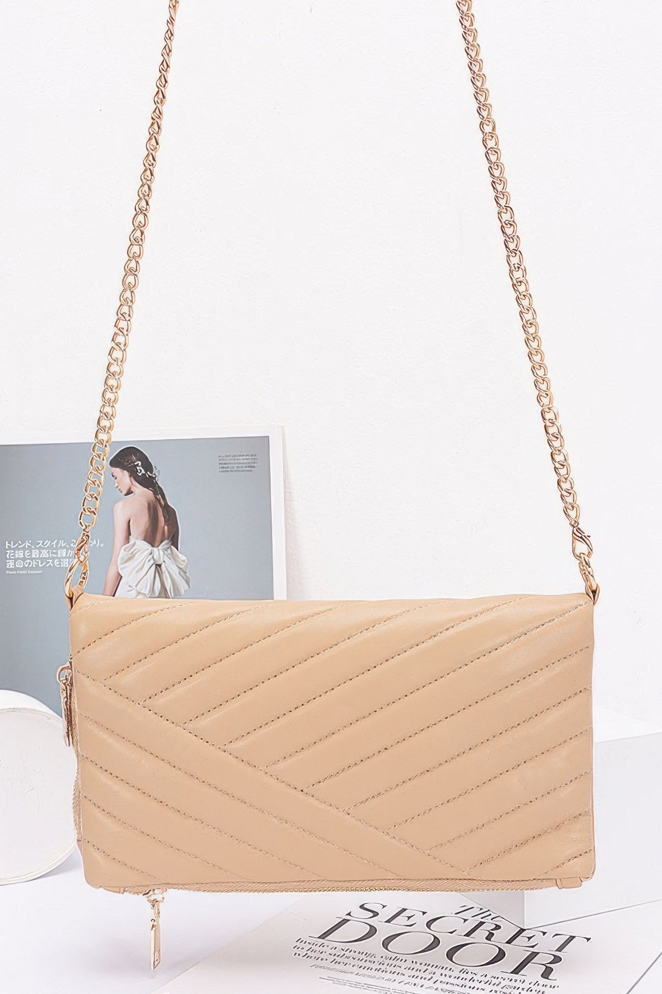 Quilted faux leather shoulder clutch, nude color with chain strap and zipper top