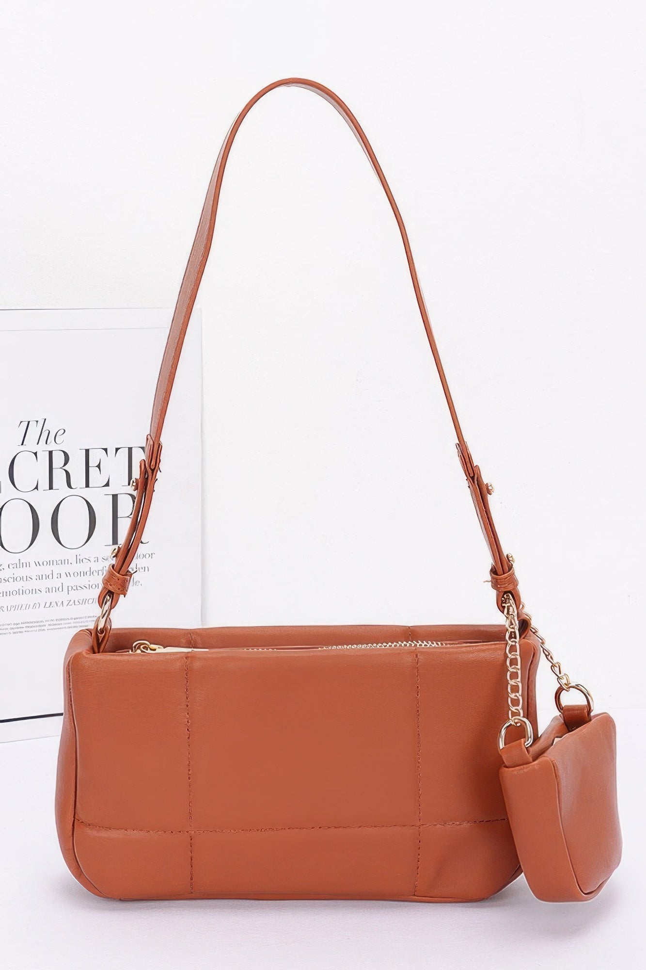 Camel quilted shoulder bag with chain strap and small AirPods pouch accessory