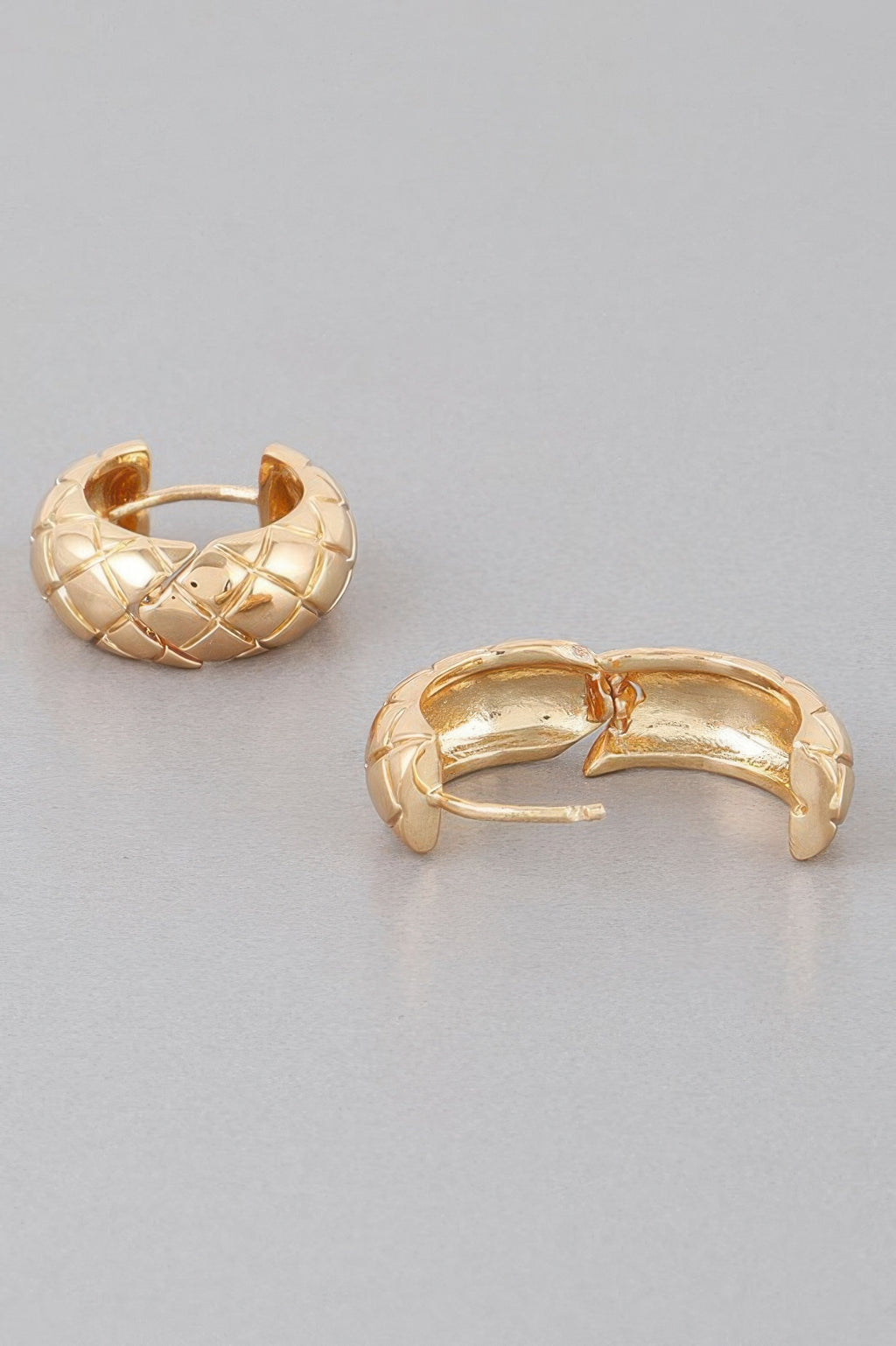 Quilted hoop earrings, gold-tone, side view with hinged back clasp