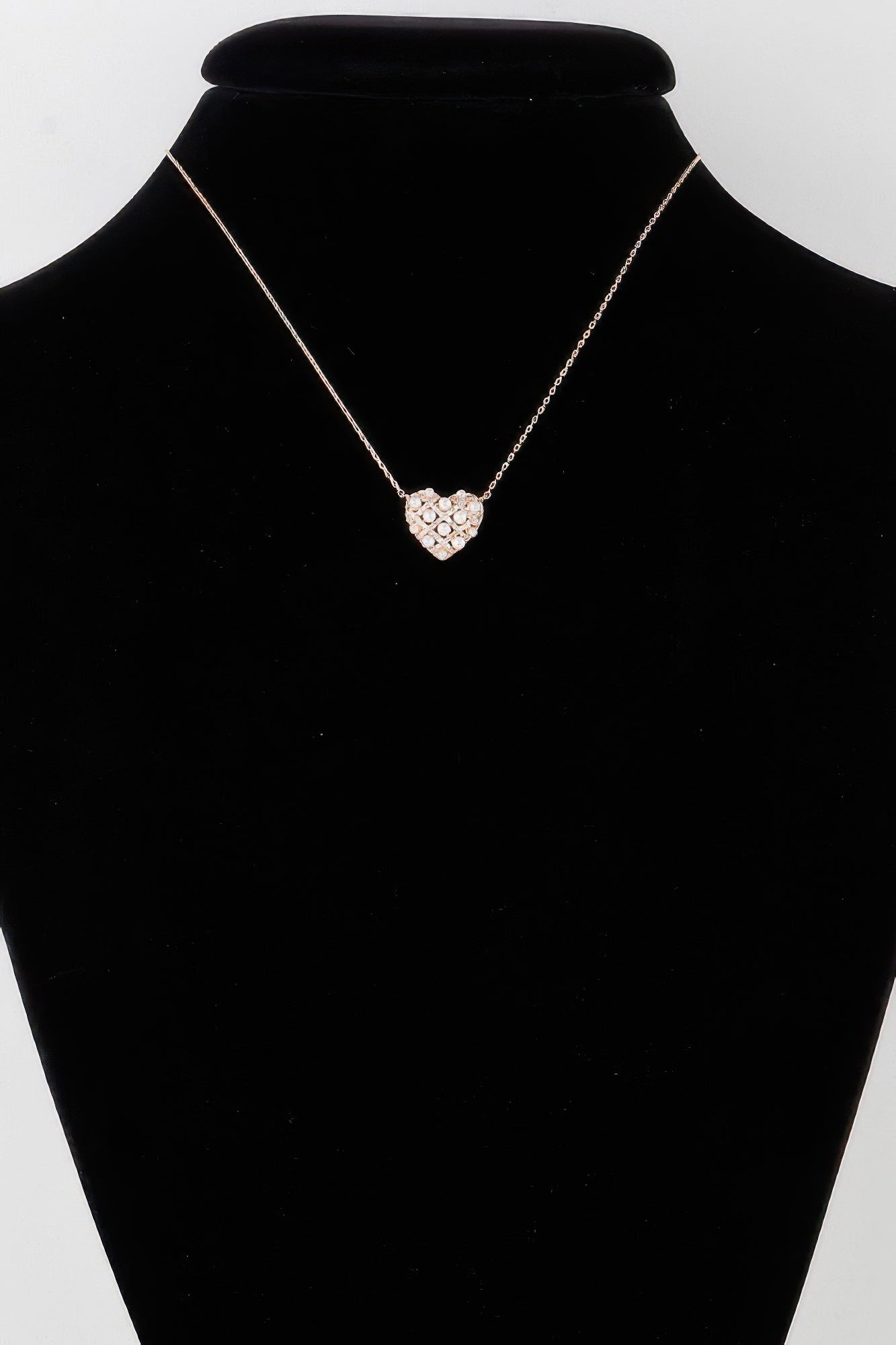 Gold pearl heart necklace with quilted-look heart pendant on thin chain