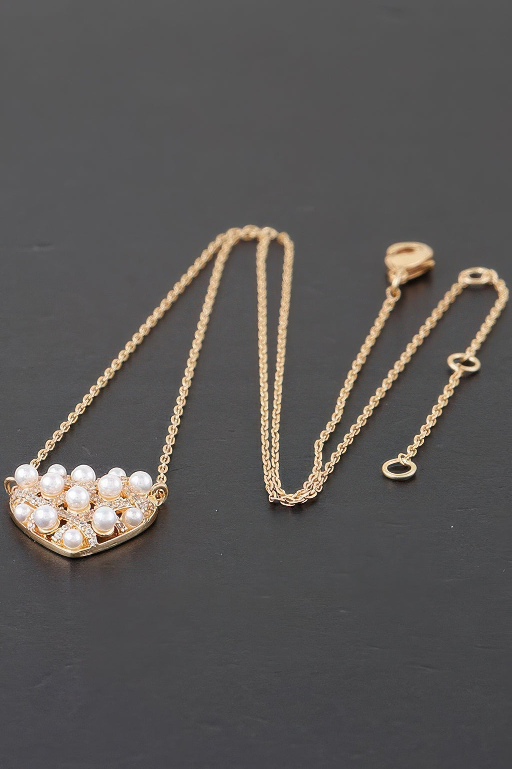 Gold pearl heart necklace with clustered white pearls heart pendant and chain