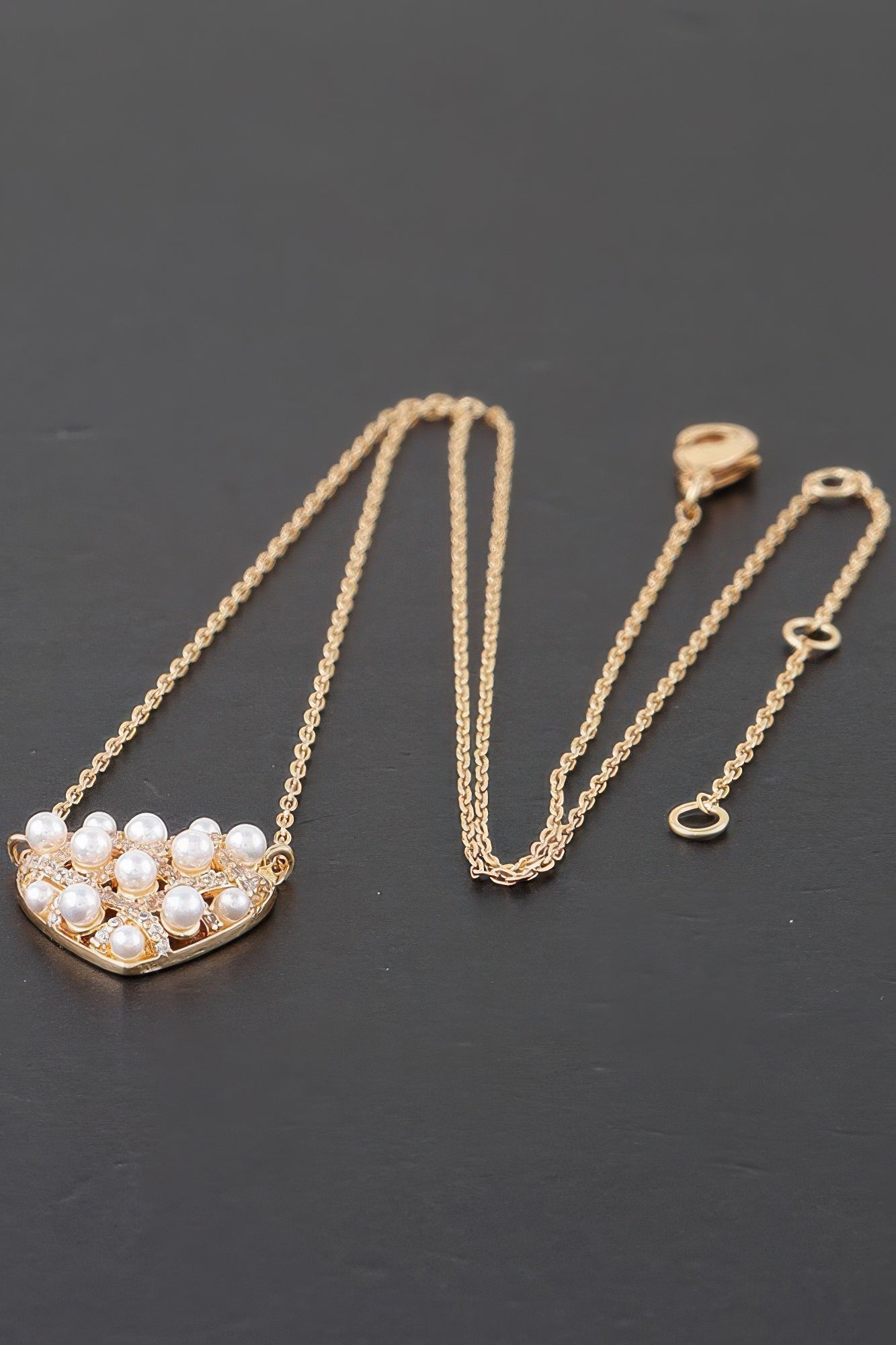 Gold pearl heart necklace with clustered white pearls heart pendant and chain