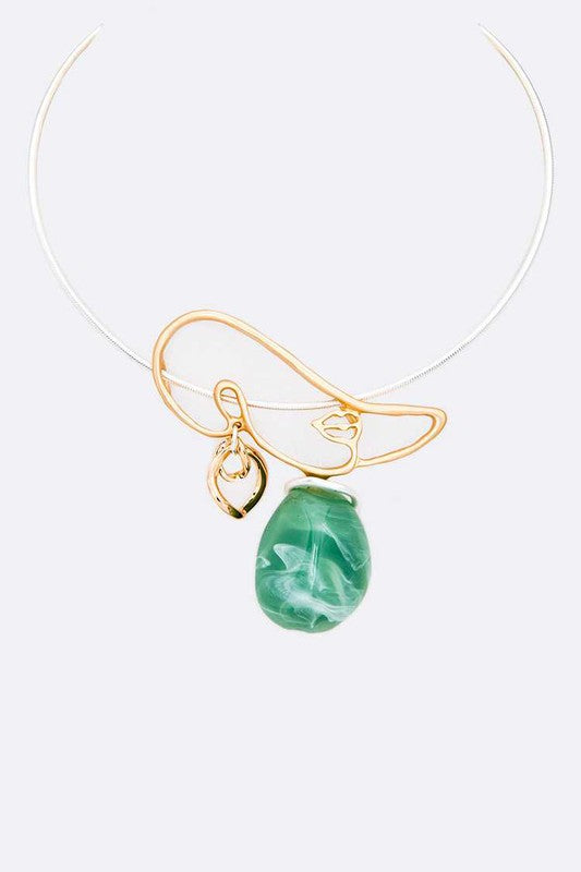 Silver choker necklace with green resin teardrop pendant and small charm accents