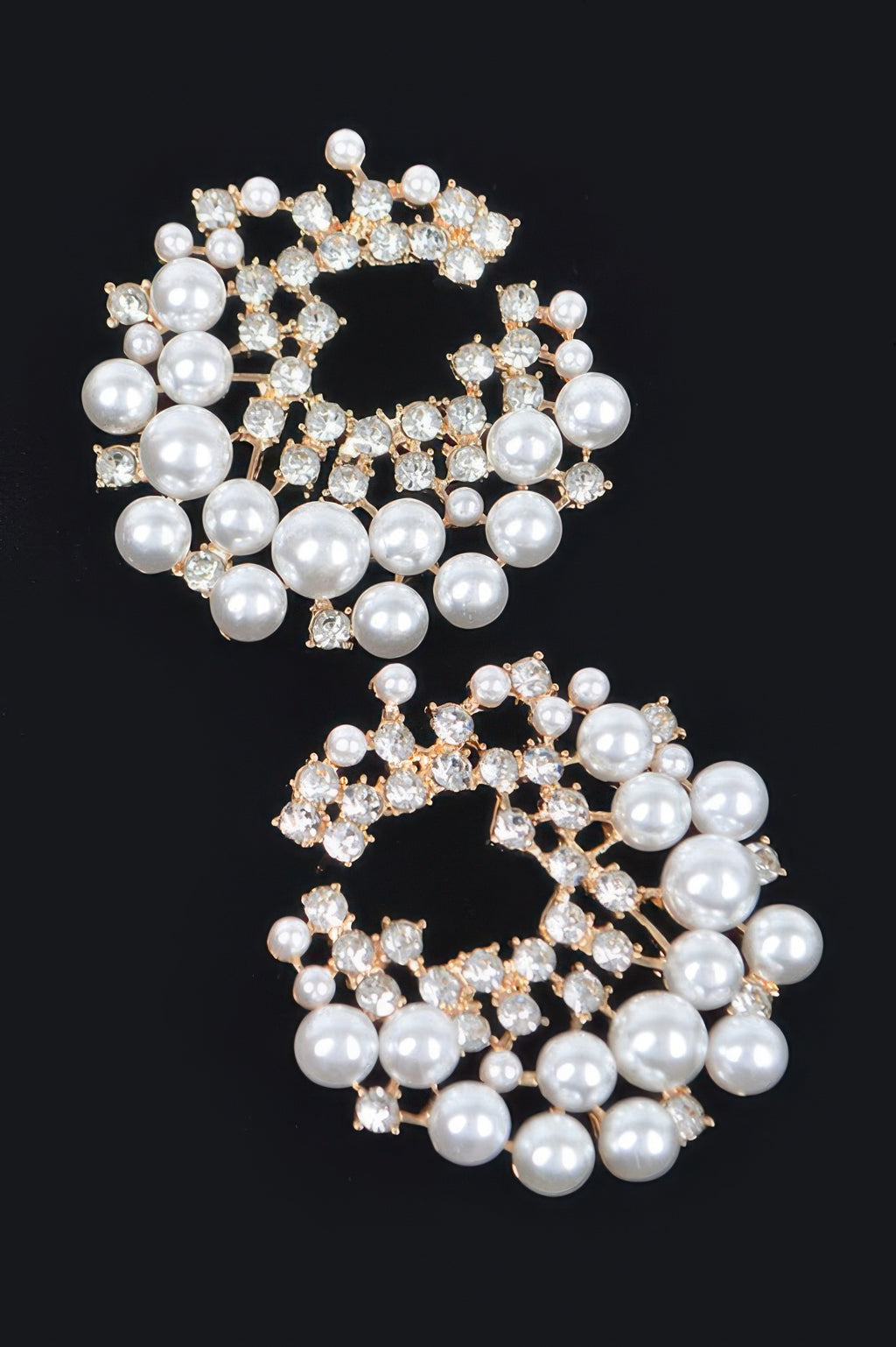 Rhinestone and pearl hoop stud earrings with round pearls and gold sparkle setting.