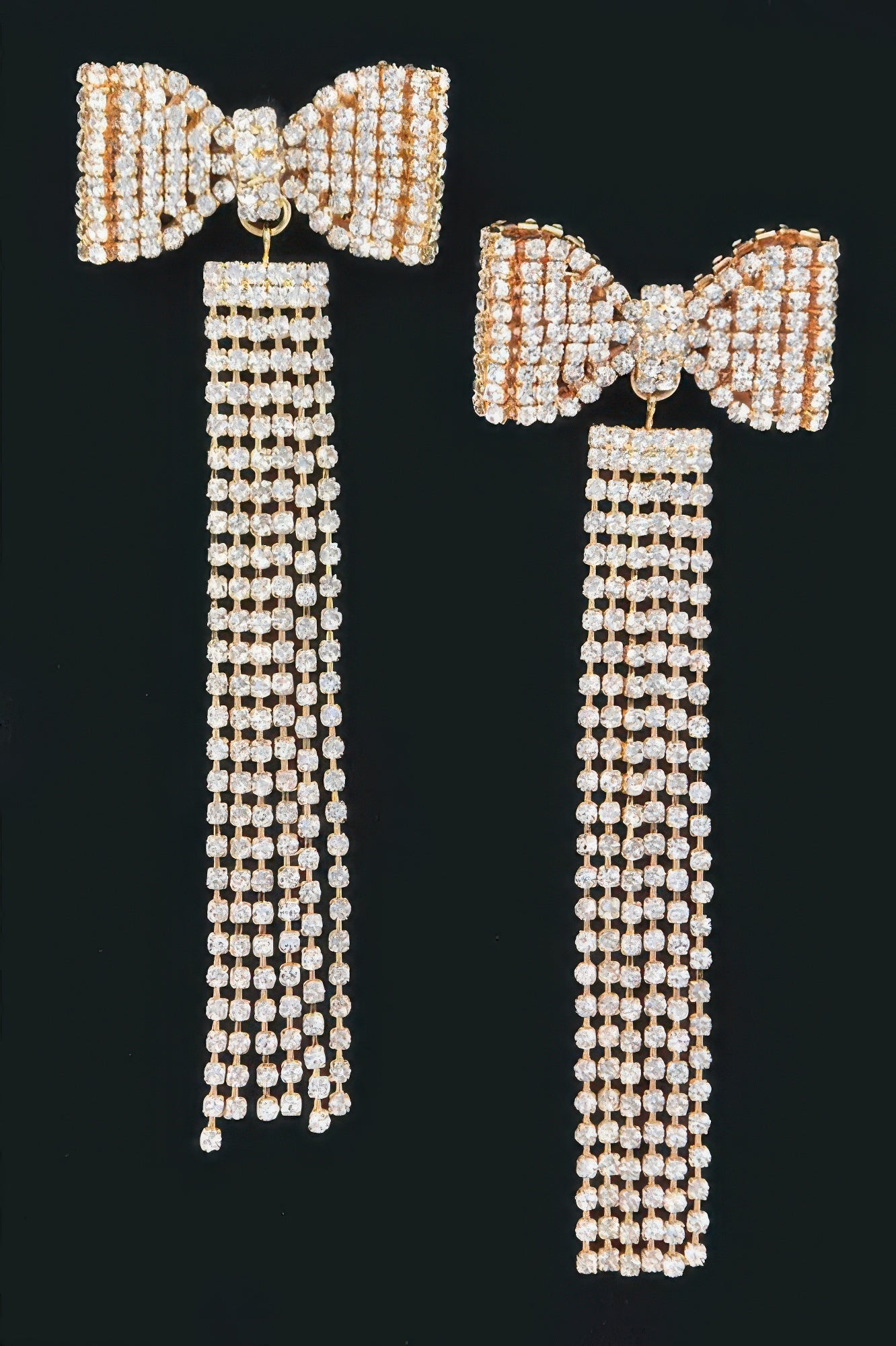 Gold-tone rhinestone bow fringe earrings with long dangling bead strands