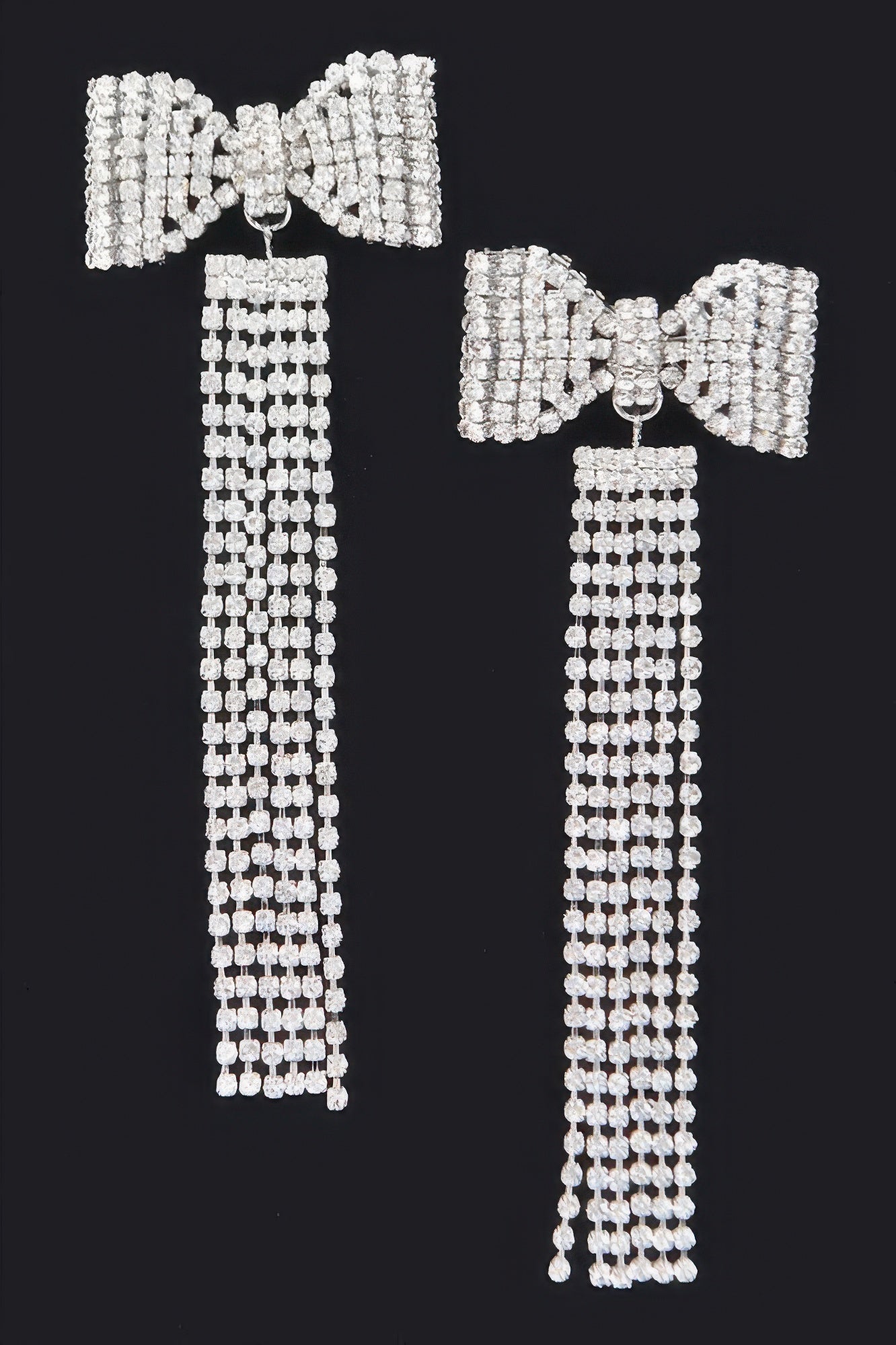Silver-tone rhinestone bow fringe earrings with long dangling bead strands