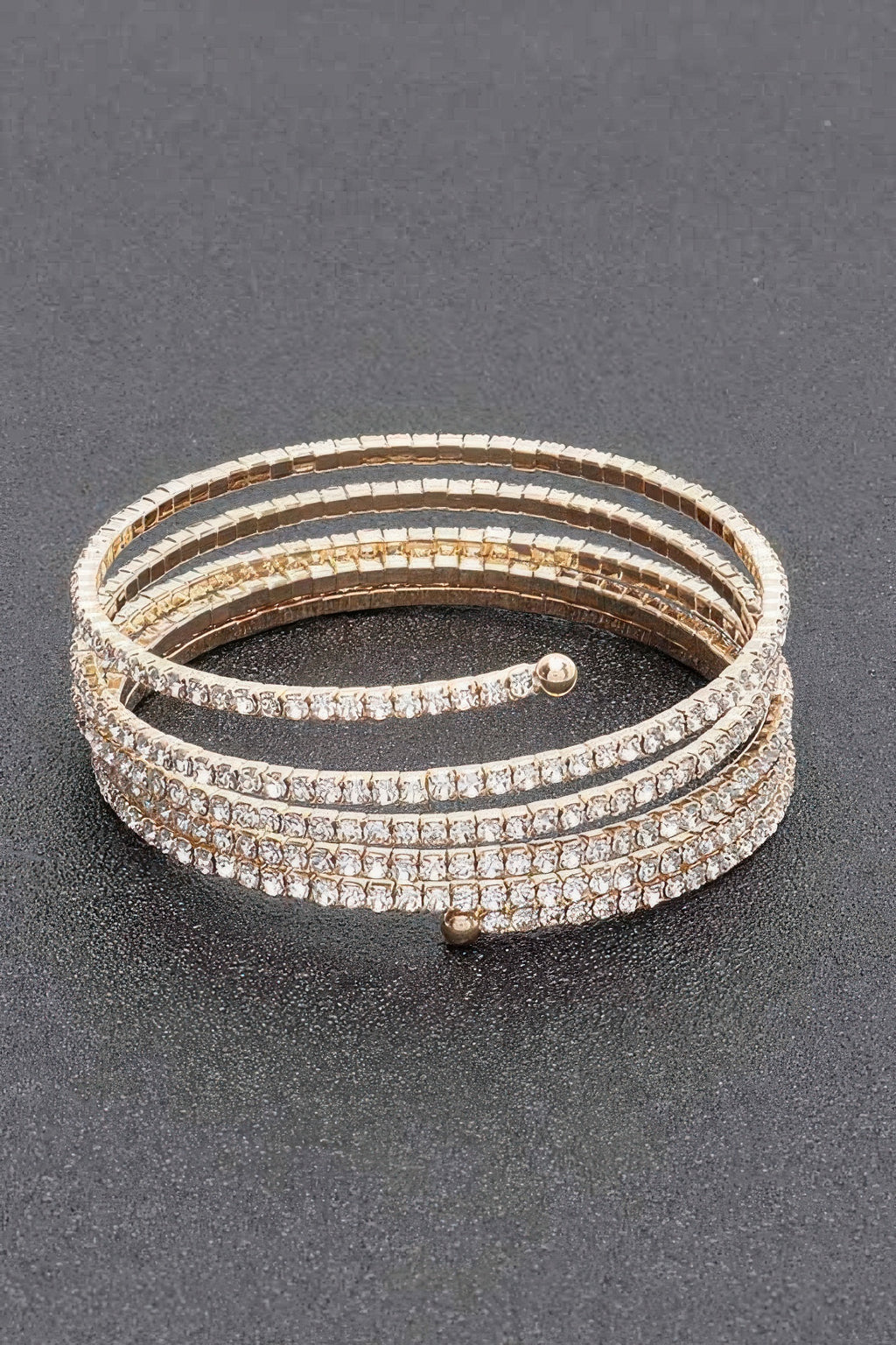 Rhinestone bracelet, gold-tone multi-row with round bead clasp