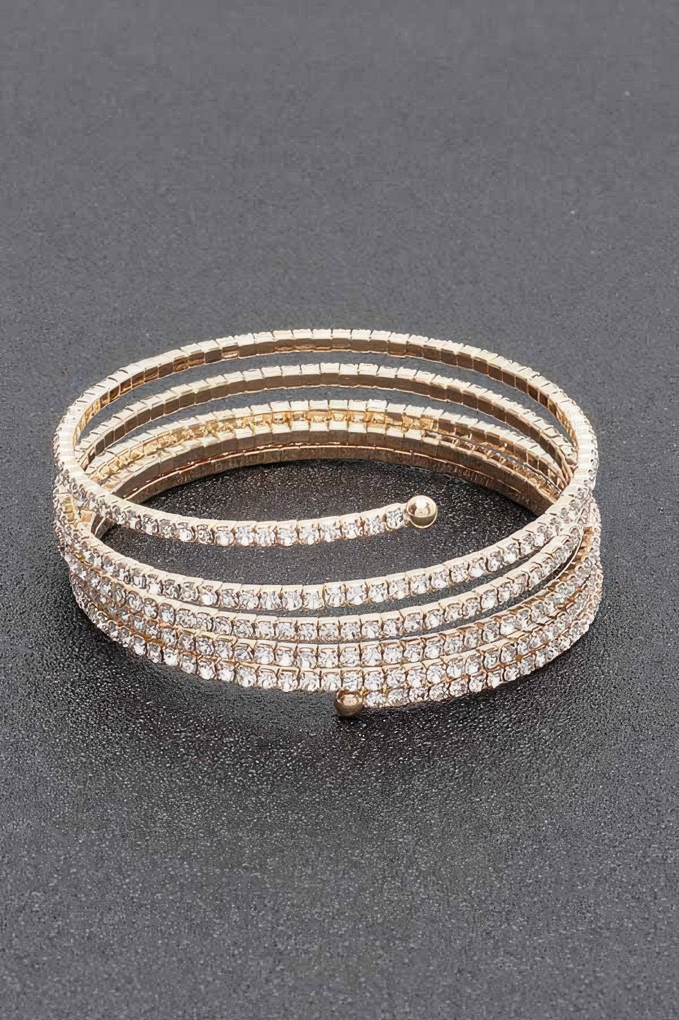 Rhinestone bracelet, gold-tone multi-row with round bead clasp