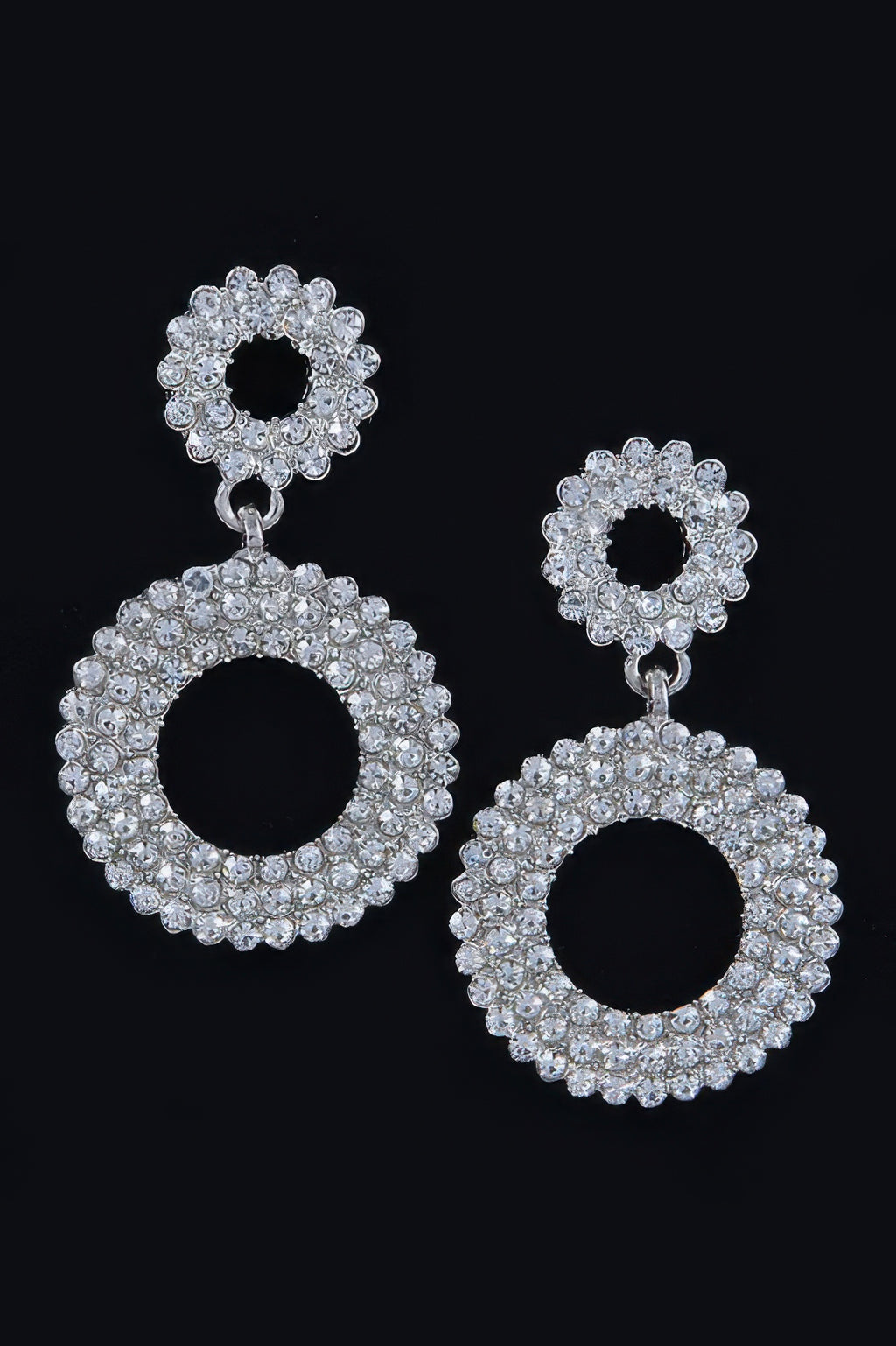 Silver-tone rhinestone dangle earrings with circular halo top and large ring drop
