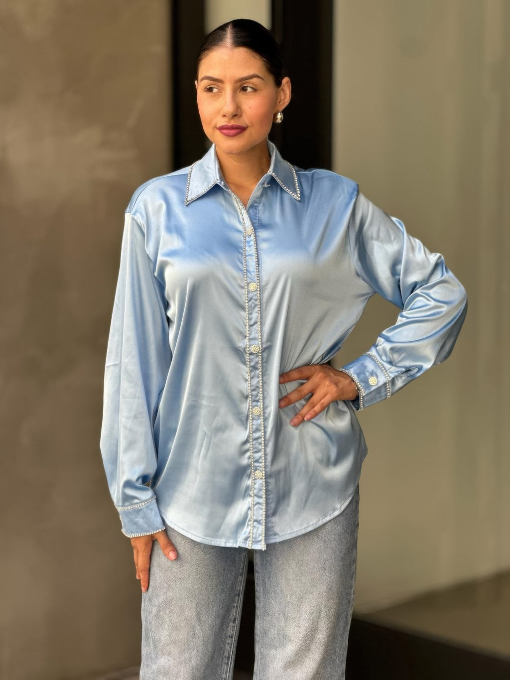 Light blue satin button-down blouse with rhinestone-trim placket and pointed collar