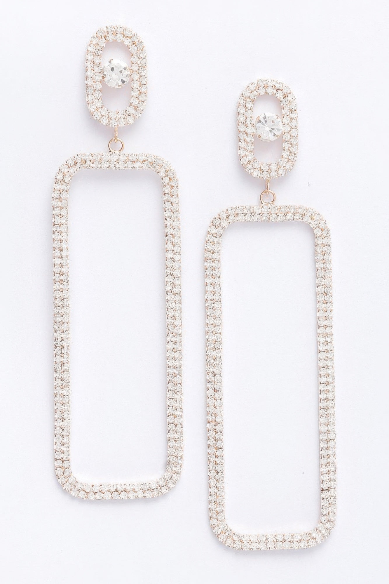 Rhinestone drop earrings with rectangular stones and oval top, gold clear