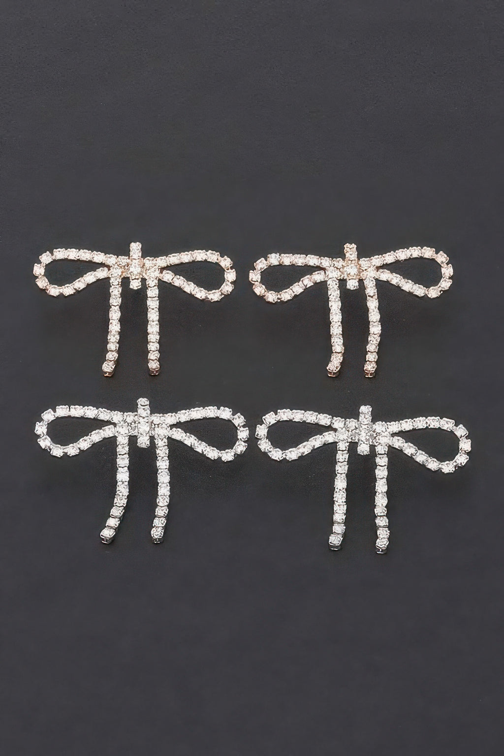 Rhinestone-Ohrringe, zwei Schleifen mit Steinstreifen und Quasten, goldfarben