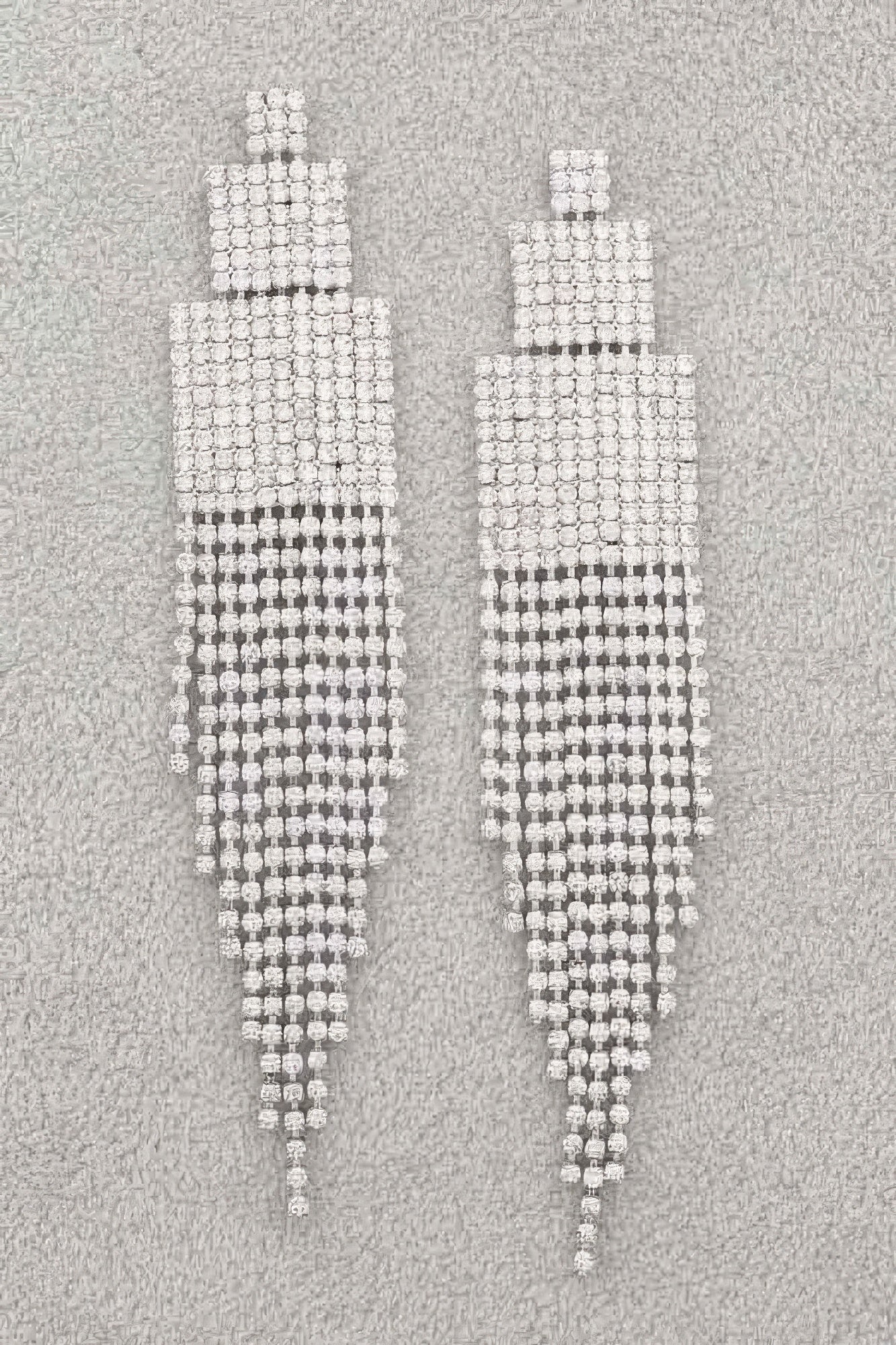 Rhinestone earrings in silver-tone with vertical fringe, square top and dangling drops