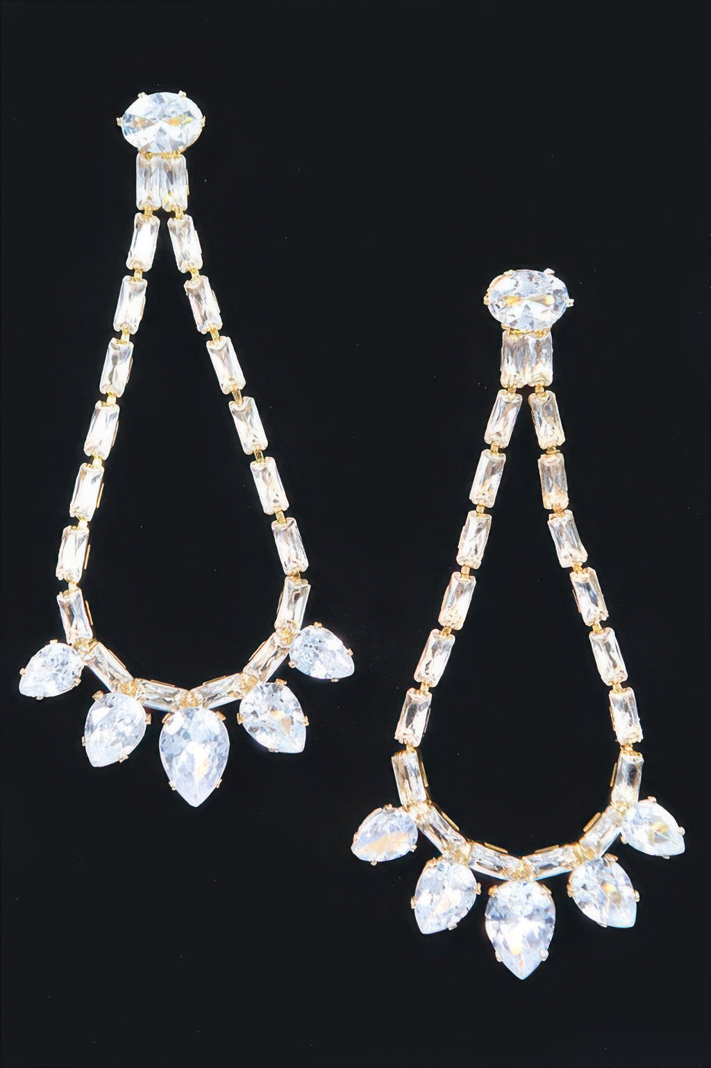 Rhinestone drop earrings with linked clear stones in a teardrop shape