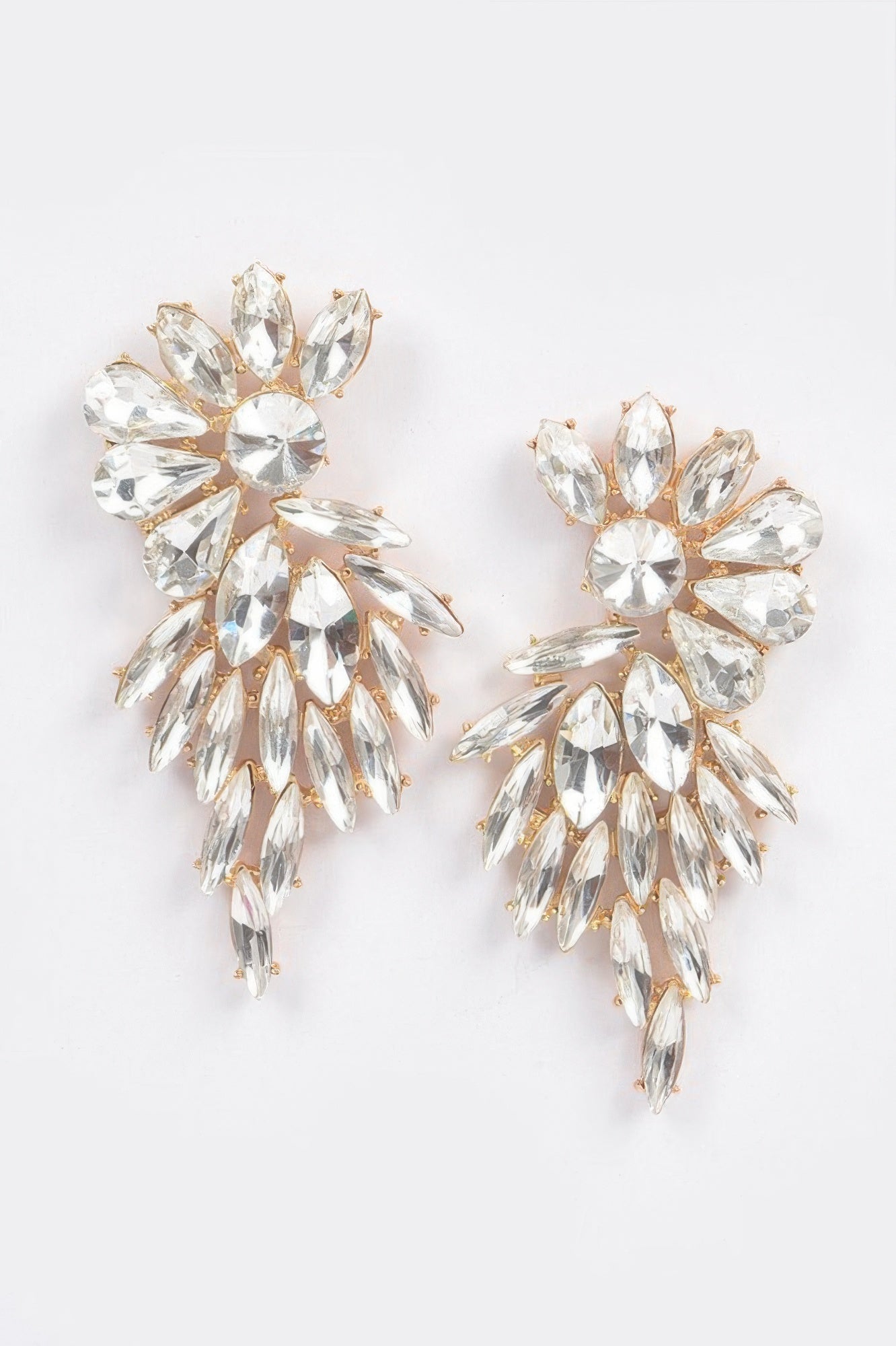 Rhinestone earrings, clear stones in gold-tone floral cluster, pair view