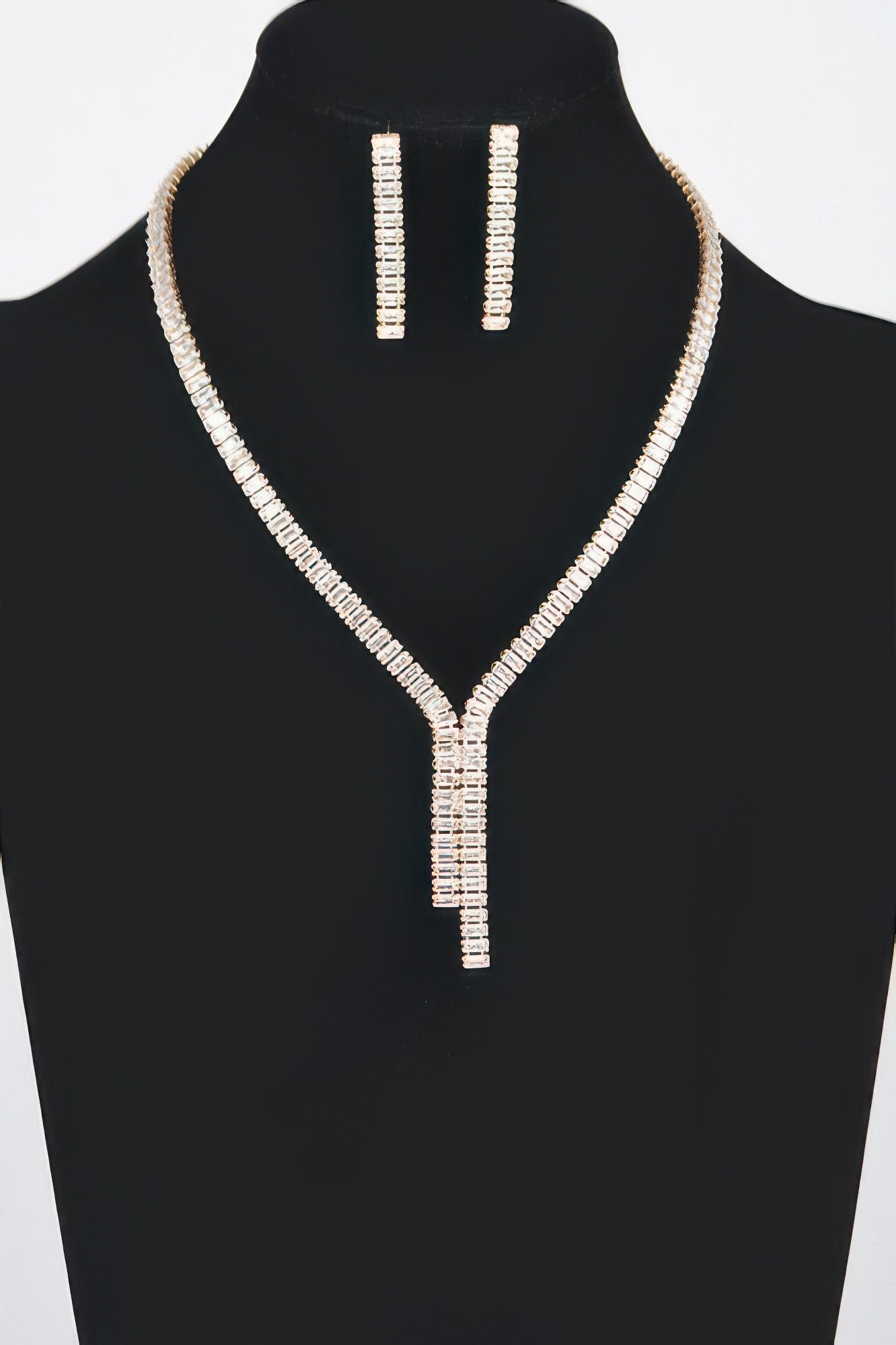 Gold rhinestone necklace set with Y-drop pendant and matching rectangular stud earrings