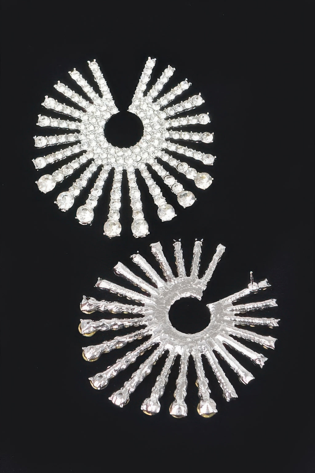 Rhinestone sunburst circle earrings in silver tone with black center and hooks