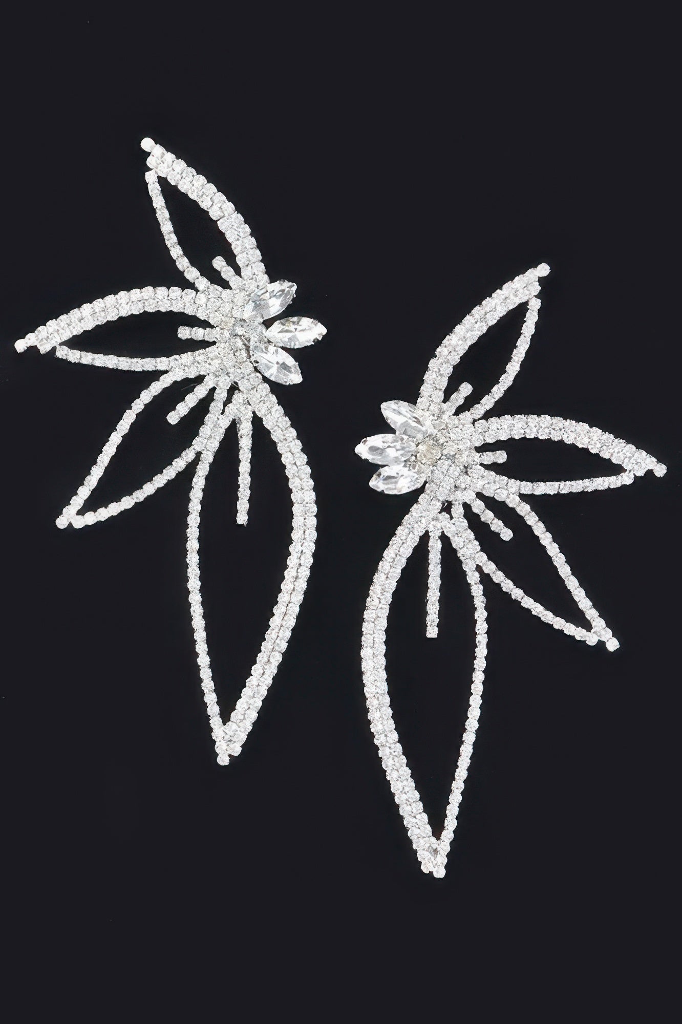 Pair of rhinestone flower earrings with dangling, leaf-like petals (silver)