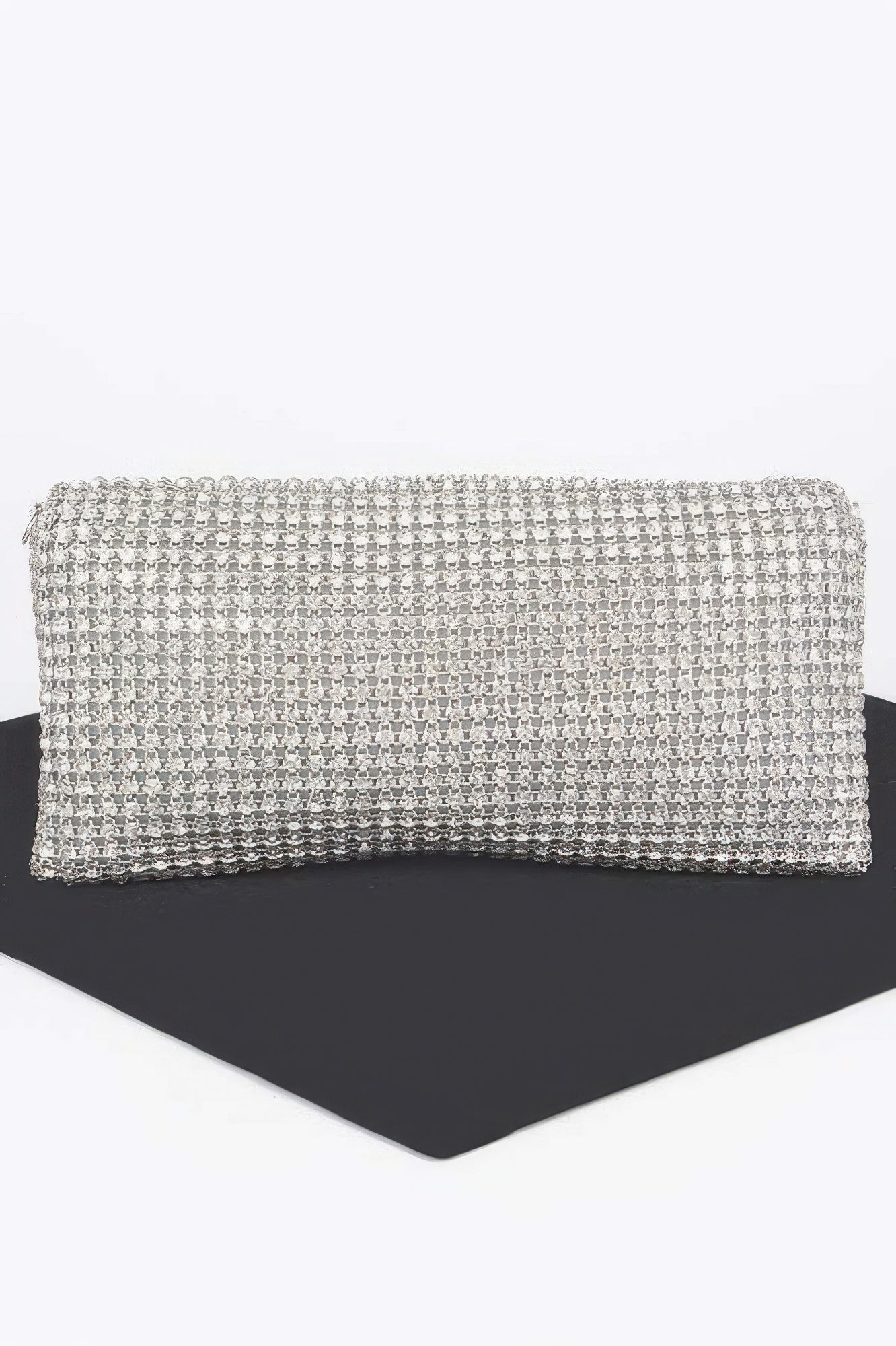 Rhinestone clutch with textured rhinestone body and dangling fringe