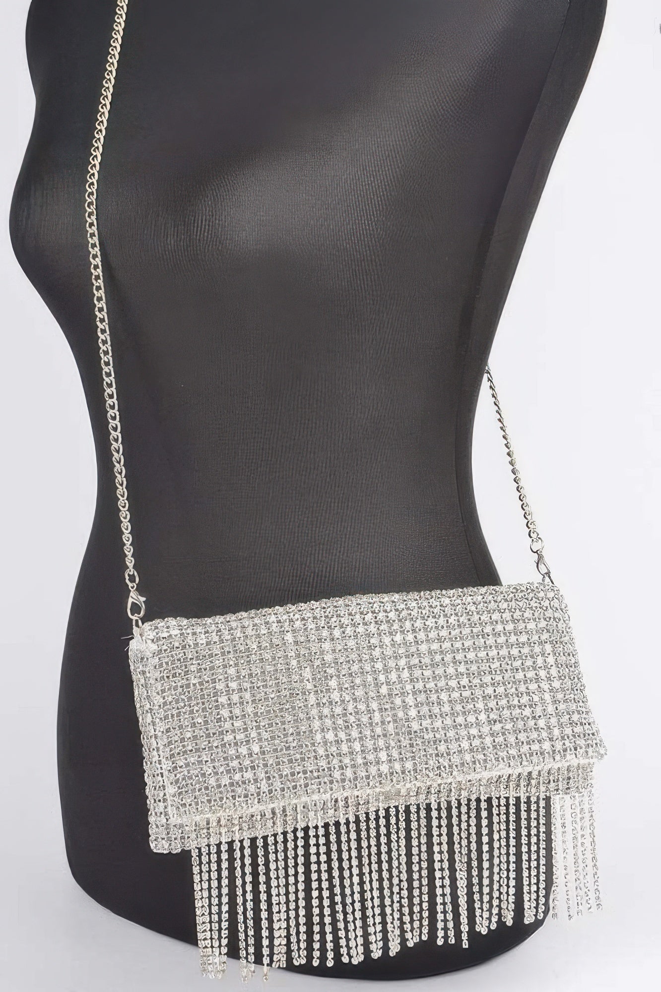 Rhinestone fringe clutch worn crossbody on chain strap