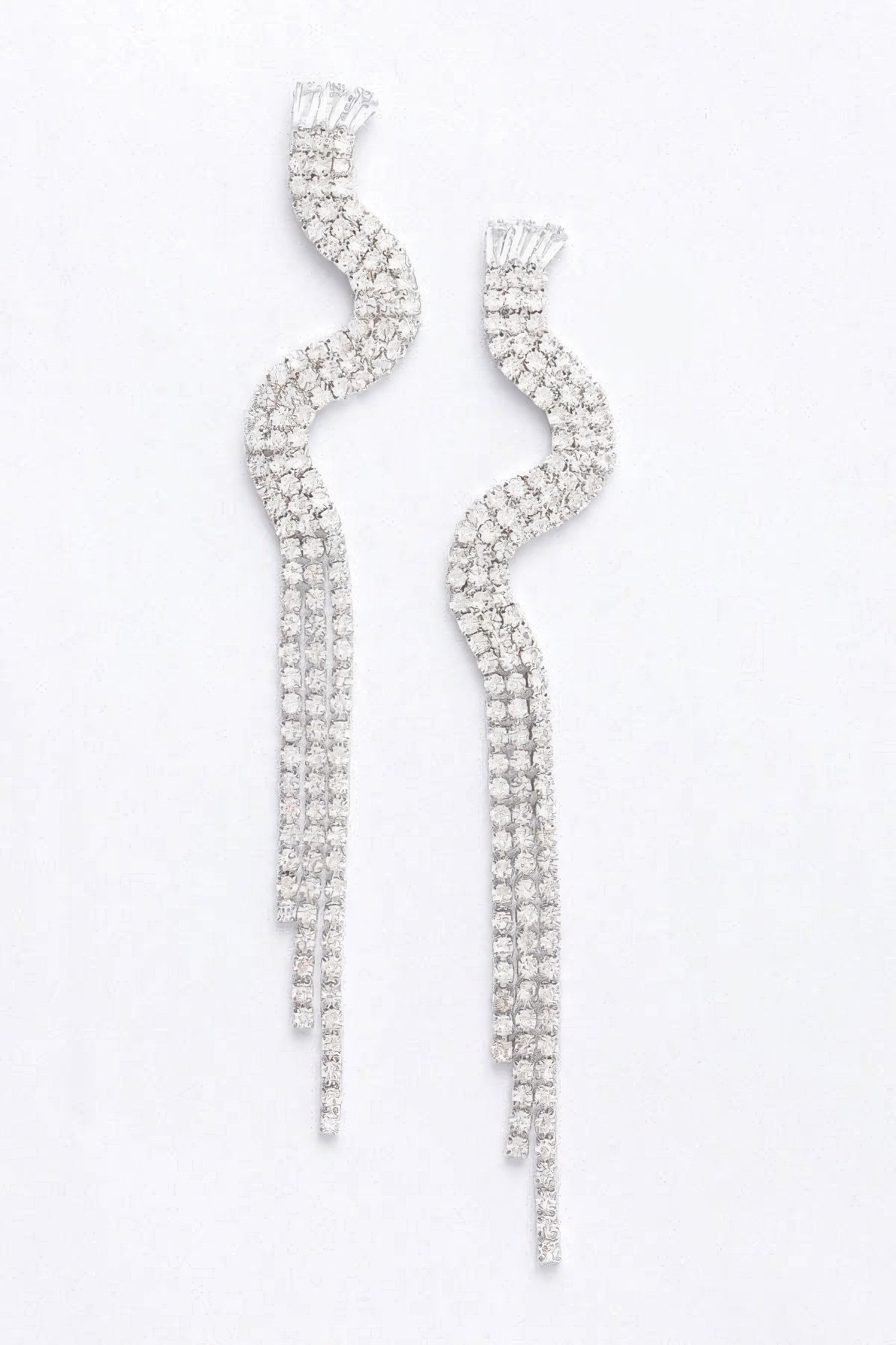 Rhinestone fringe earrings in silver clear, long curved drop with dangling strands