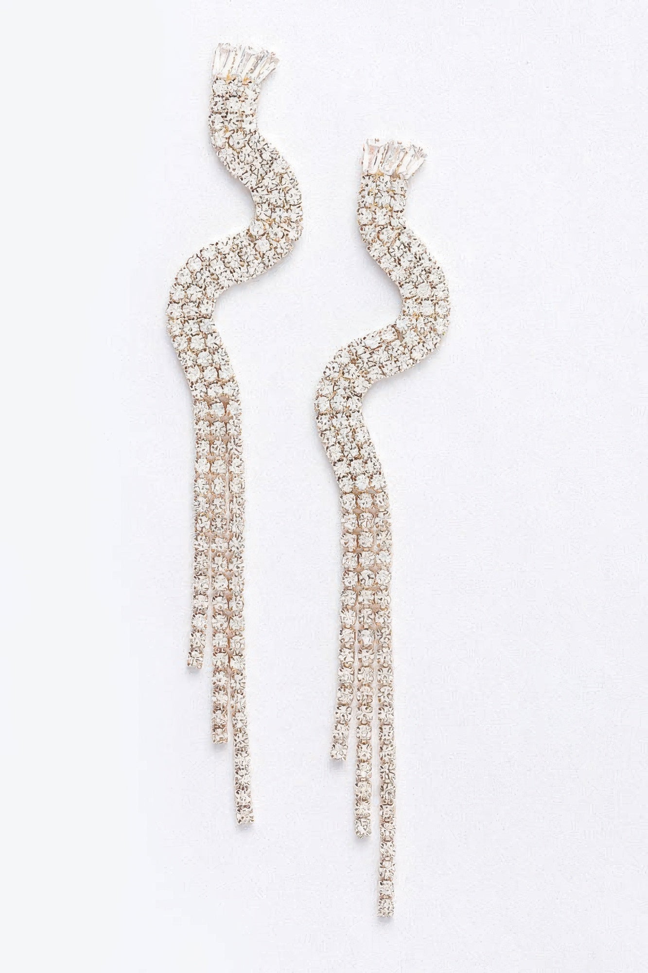 Rhinestone fringe earrings in gold clear, curved sparkly drop with tassel fringe