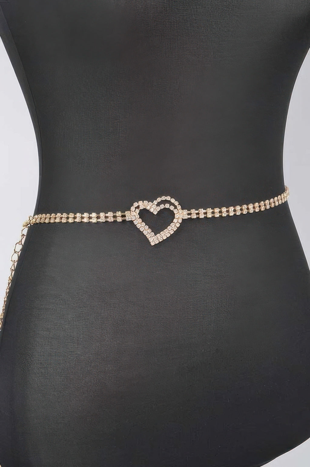 Rhinestone heart chain belt showing heart charm centered on the gold-tone band
