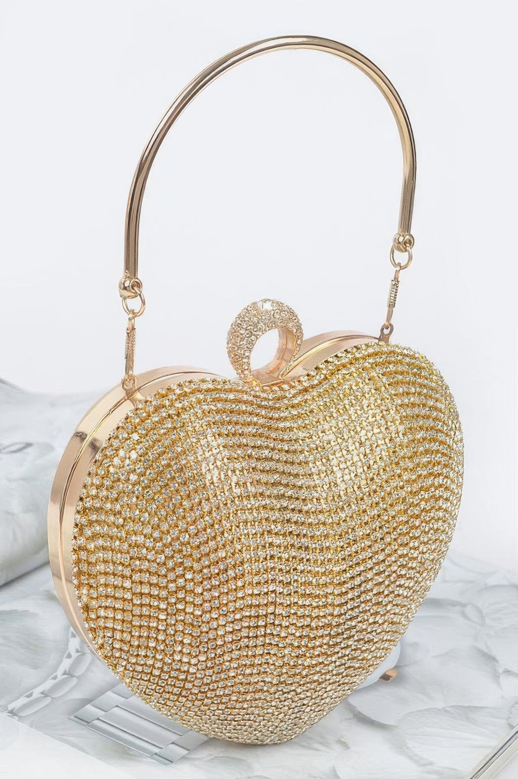 Clear gold rhinestone heart clutch with round top ring handle and shoulder chain