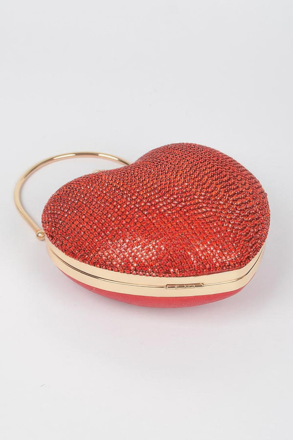 Red rhinestone heart clutch with top handle and gold-tone frame detail