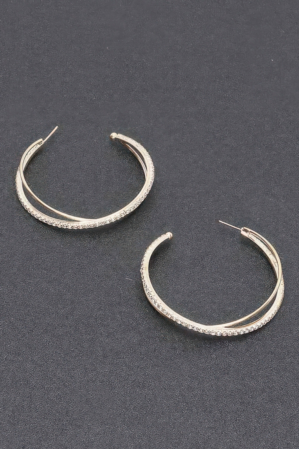 Rhinestone hoop earrings, silver-toned oval hoops with clear stones