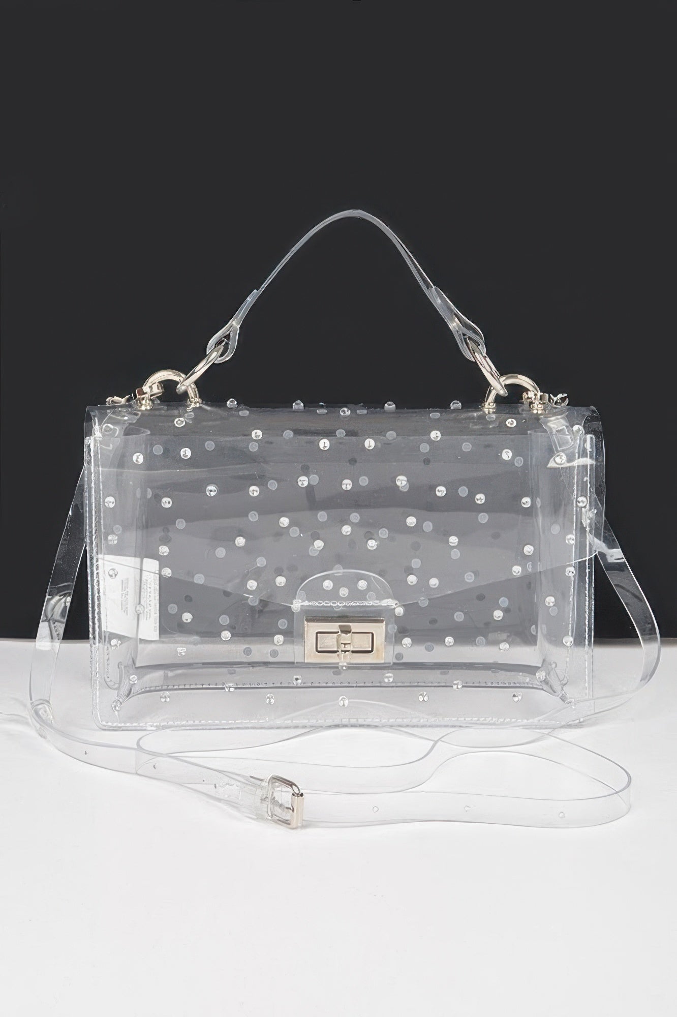 Clear rhinestone hot-fix bag with silver studs, top handles and center clasp
