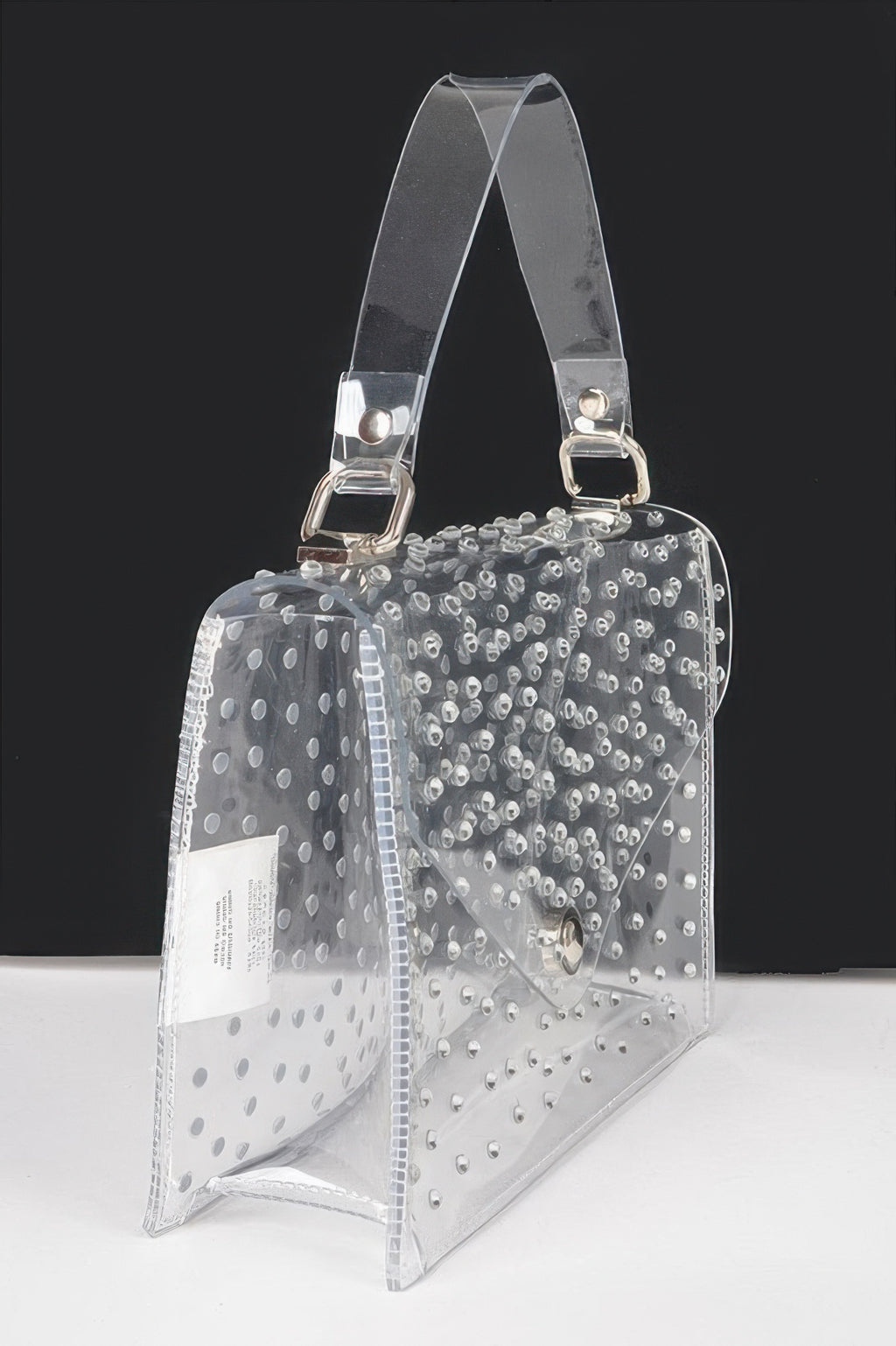 Clear silver rhinestone crossbody bag with adjustable strap and side window panel.