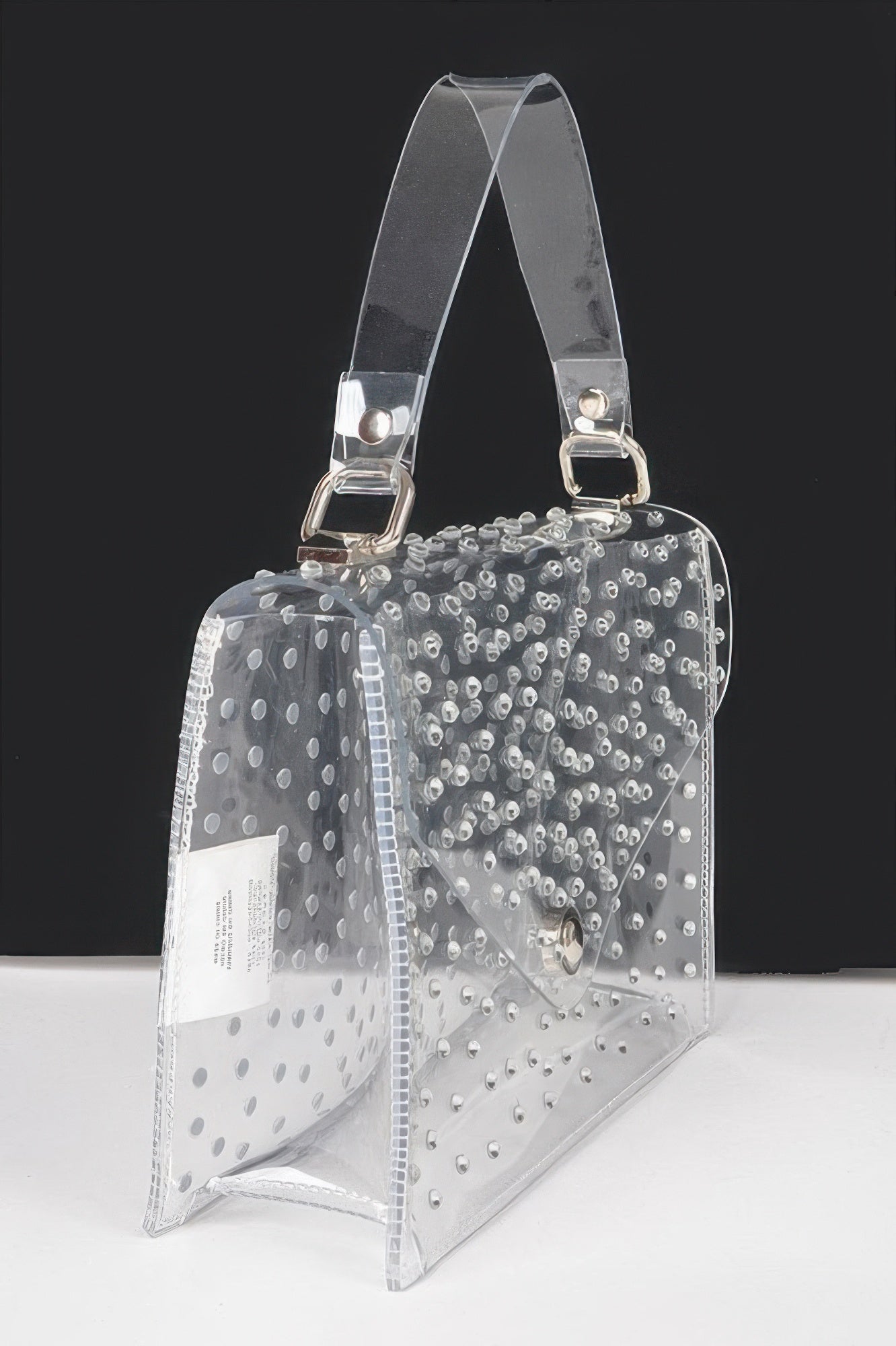 Clear silver rhinestone crossbody bag with adjustable strap and side window panel.