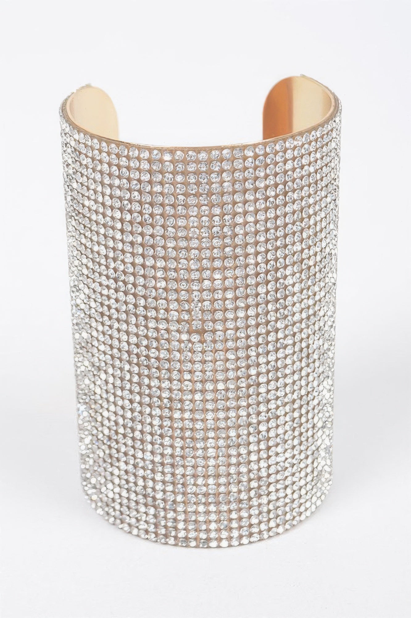Silver rhinestone metal cuff bracelet with wide open bangle.