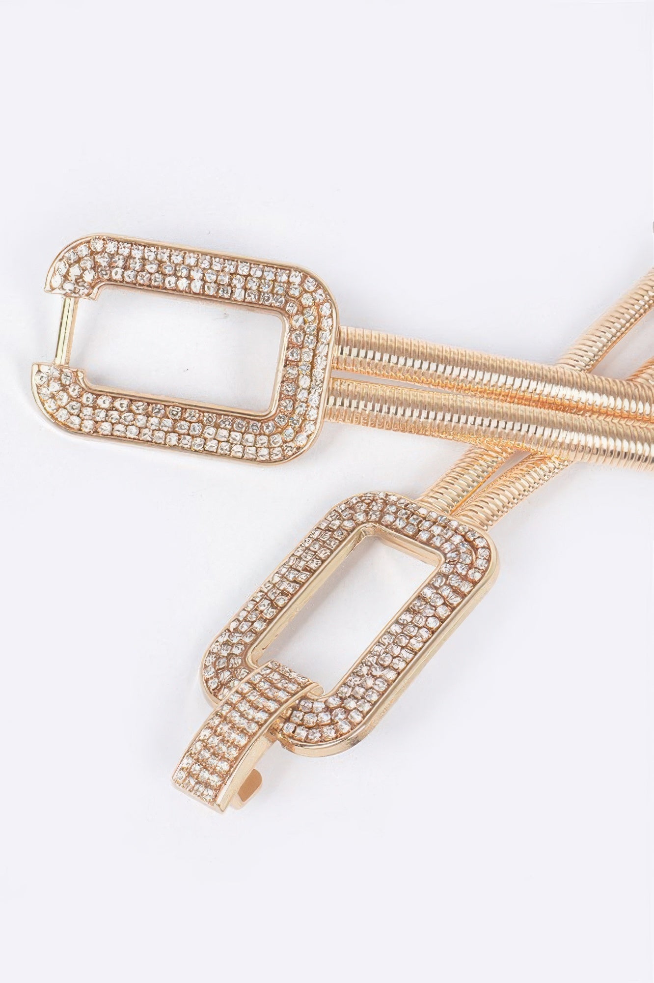 Gold-tone rhinestone buckle stretch belt with two rectangular frames.