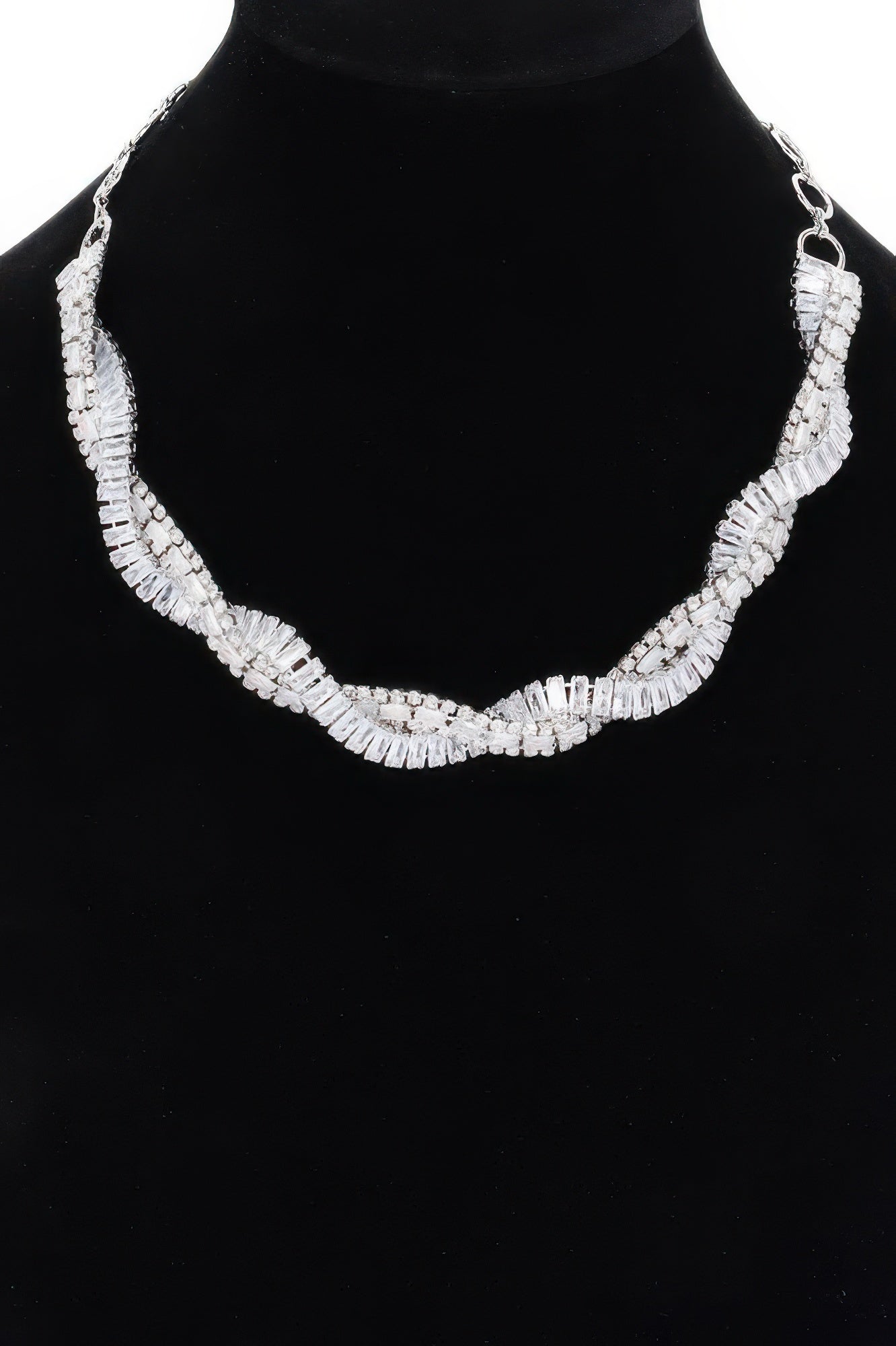 Rhinestone necklace featuring clear baguette stones arranged in a U-shaped row