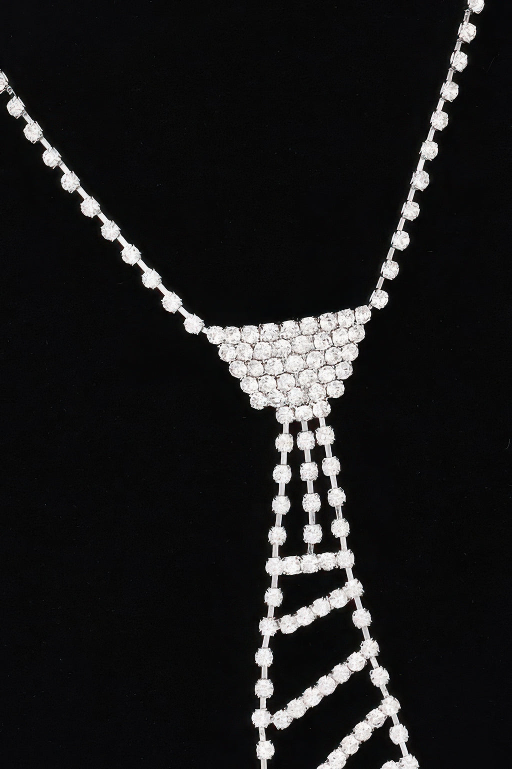 Rhinestone tie necklace pendant with matching chain, silver-tone, close-up view