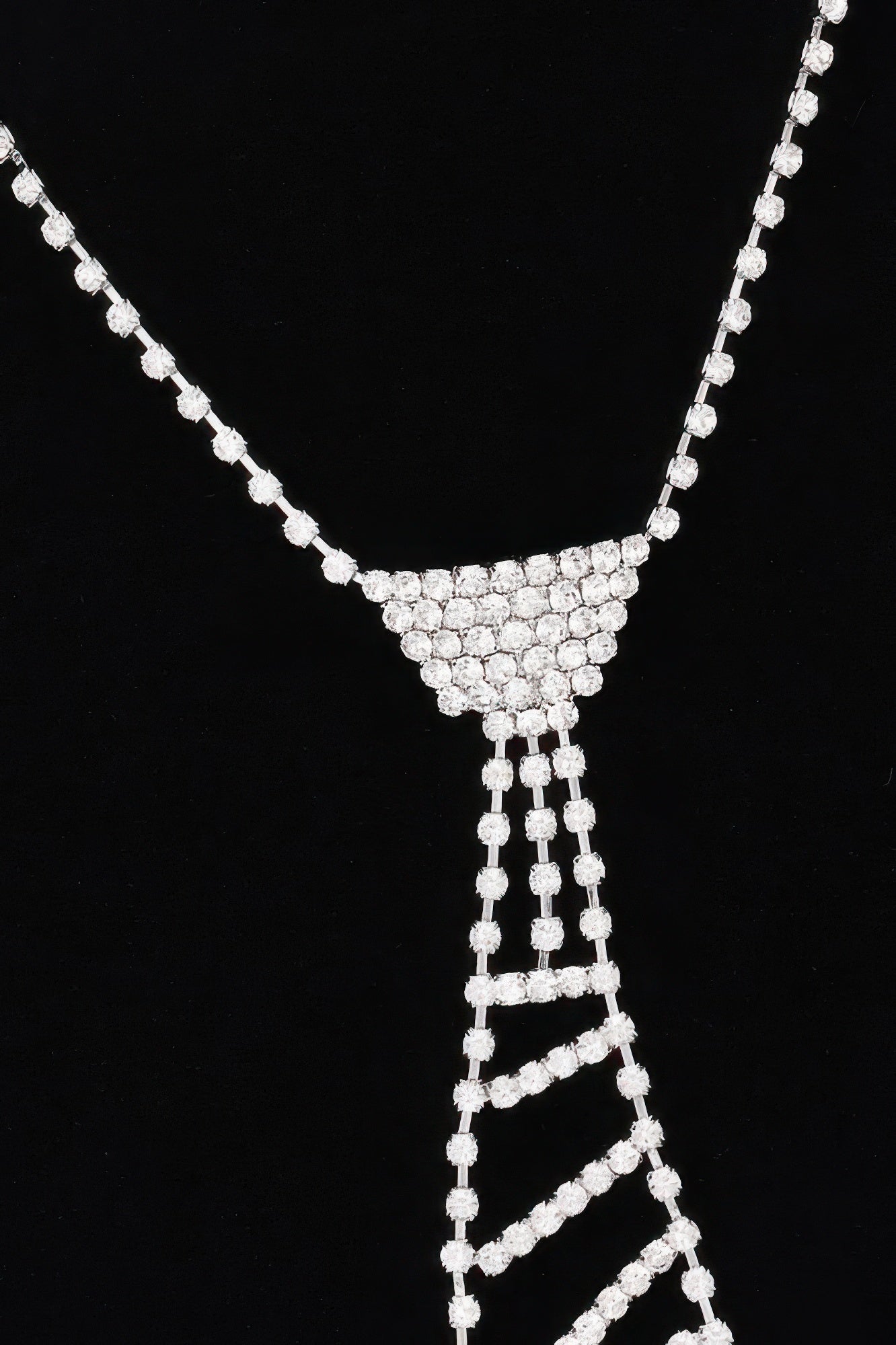Rhinestone tie necklace pendant with matching chain, silver-tone, close-up view