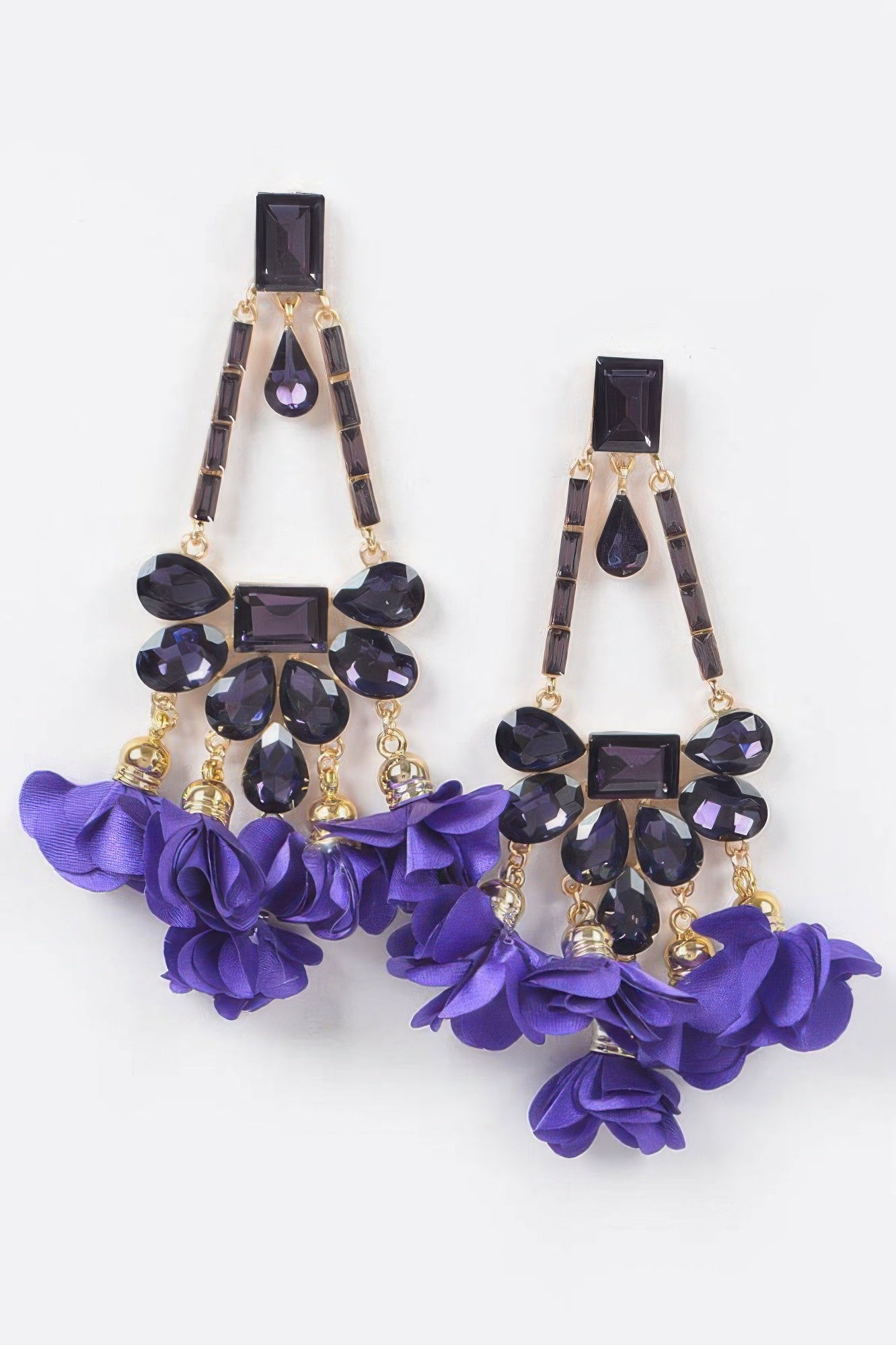Purple rhinestone drop earrings with dark stones and layered purple fabric flowers