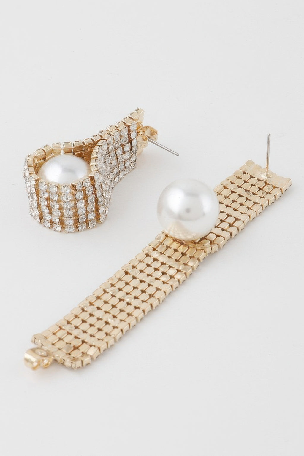 Long gold-cream rhinestone wrap earrings with large white pearl, dangling bar shape
