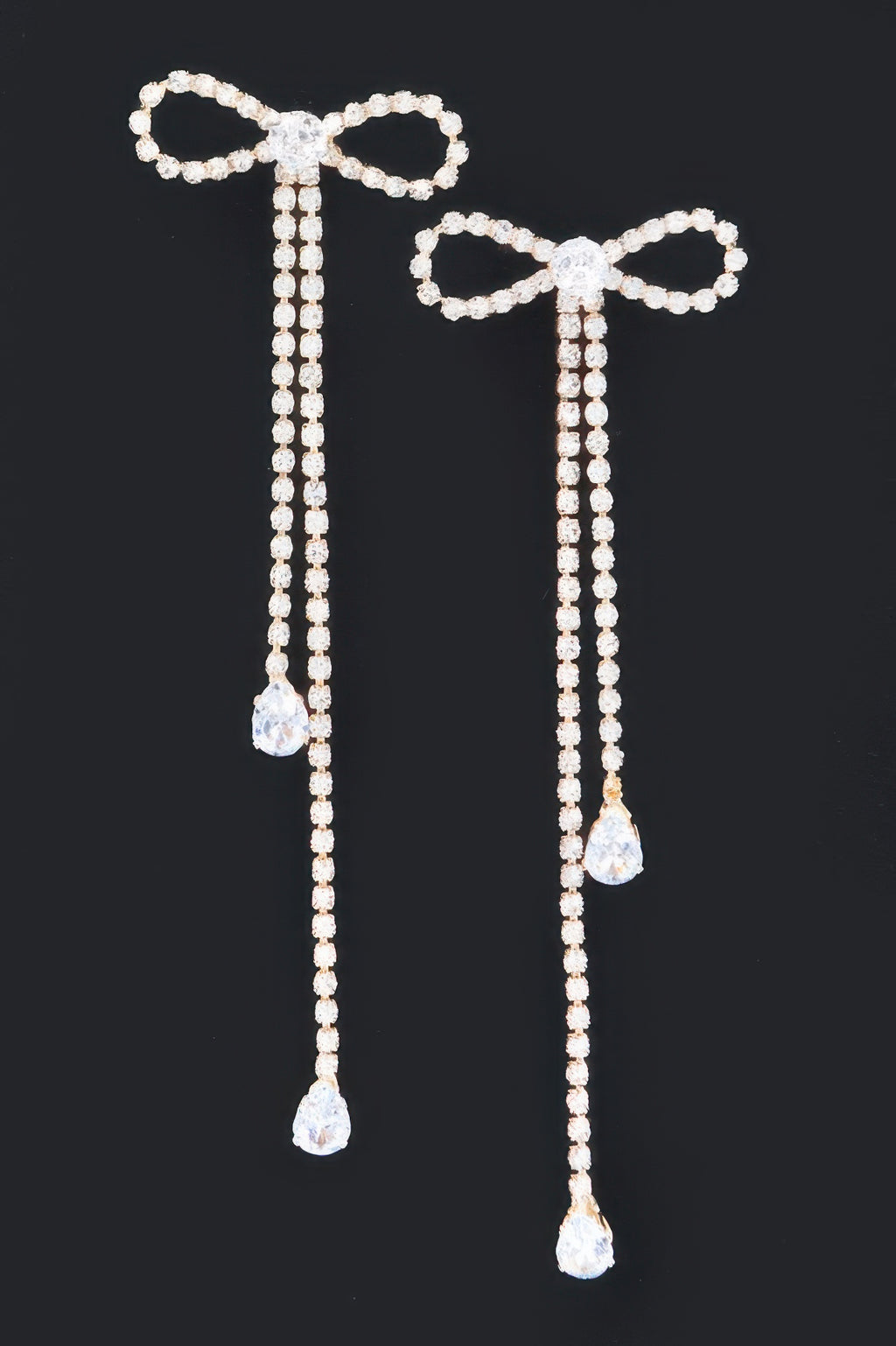Rhinestone ribbon drop earrings, bow detail and three teardrop stones on each
