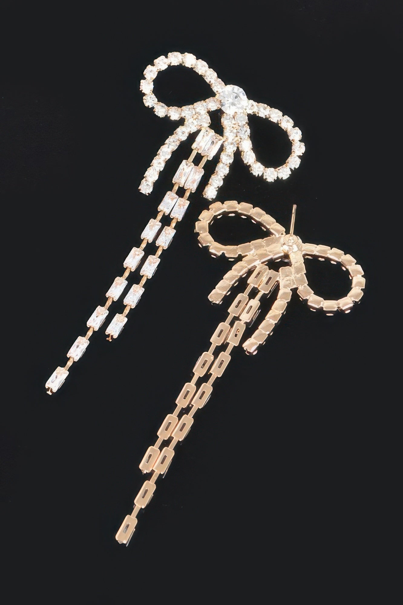 Rhinestone ribbon earrings, silver-tone with oval sparkly loops and long tassel drops
