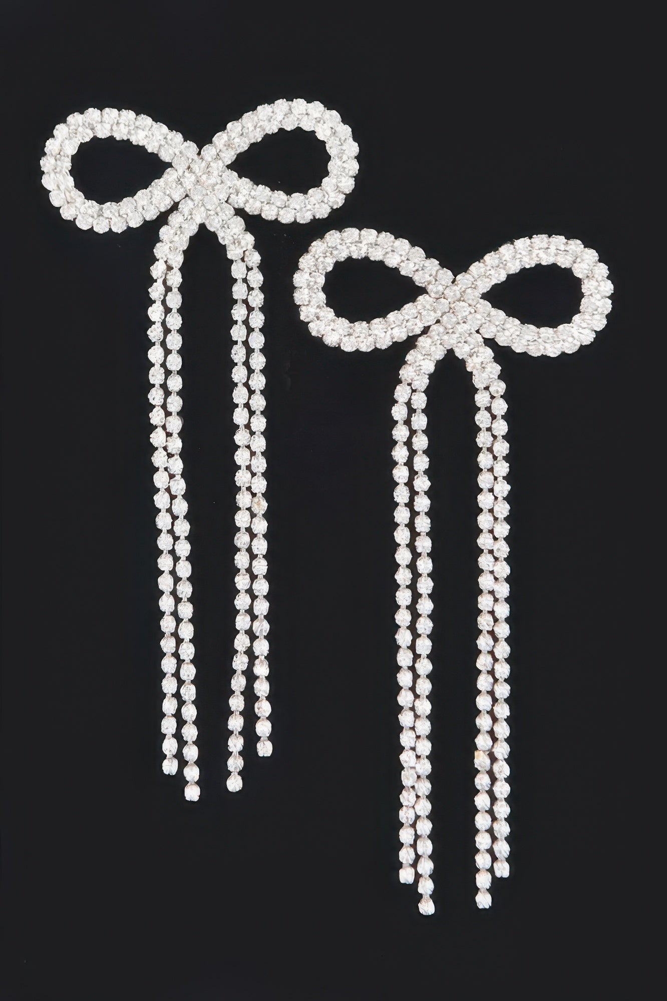 Rhinestone ribbon earrings, silver-tone bow with long fringe drop strands